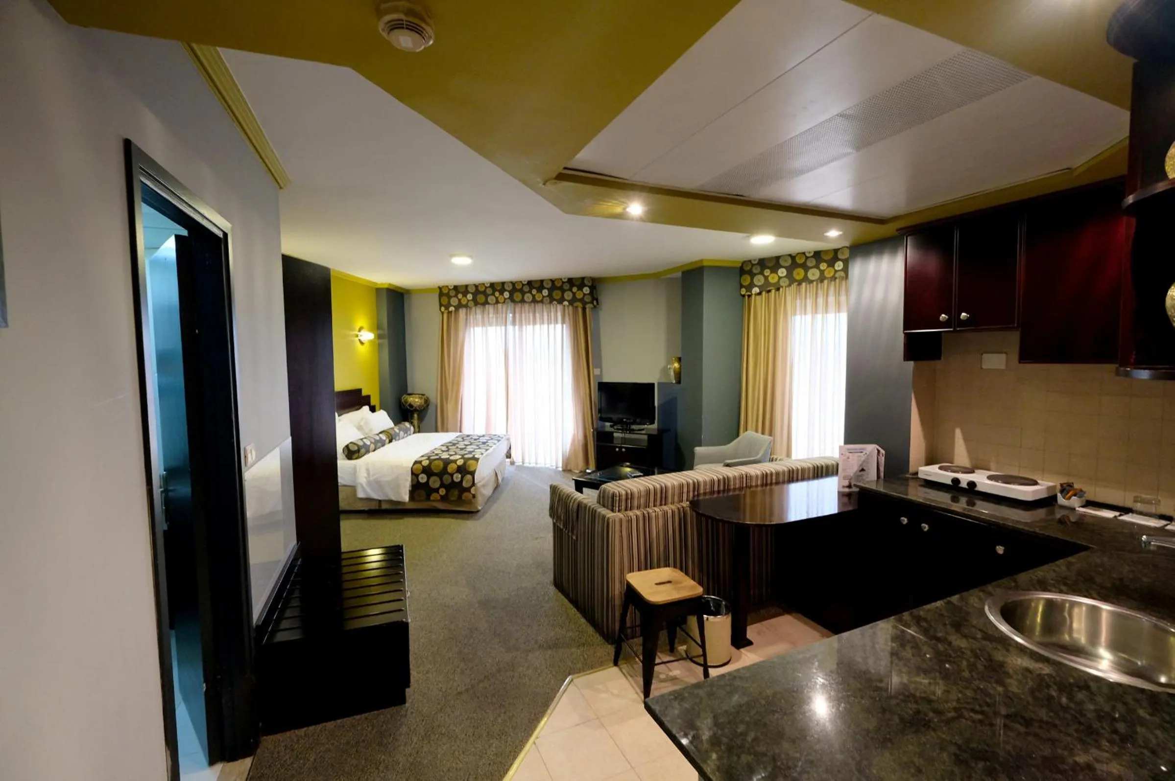 Bed in Royal Court Hotel
