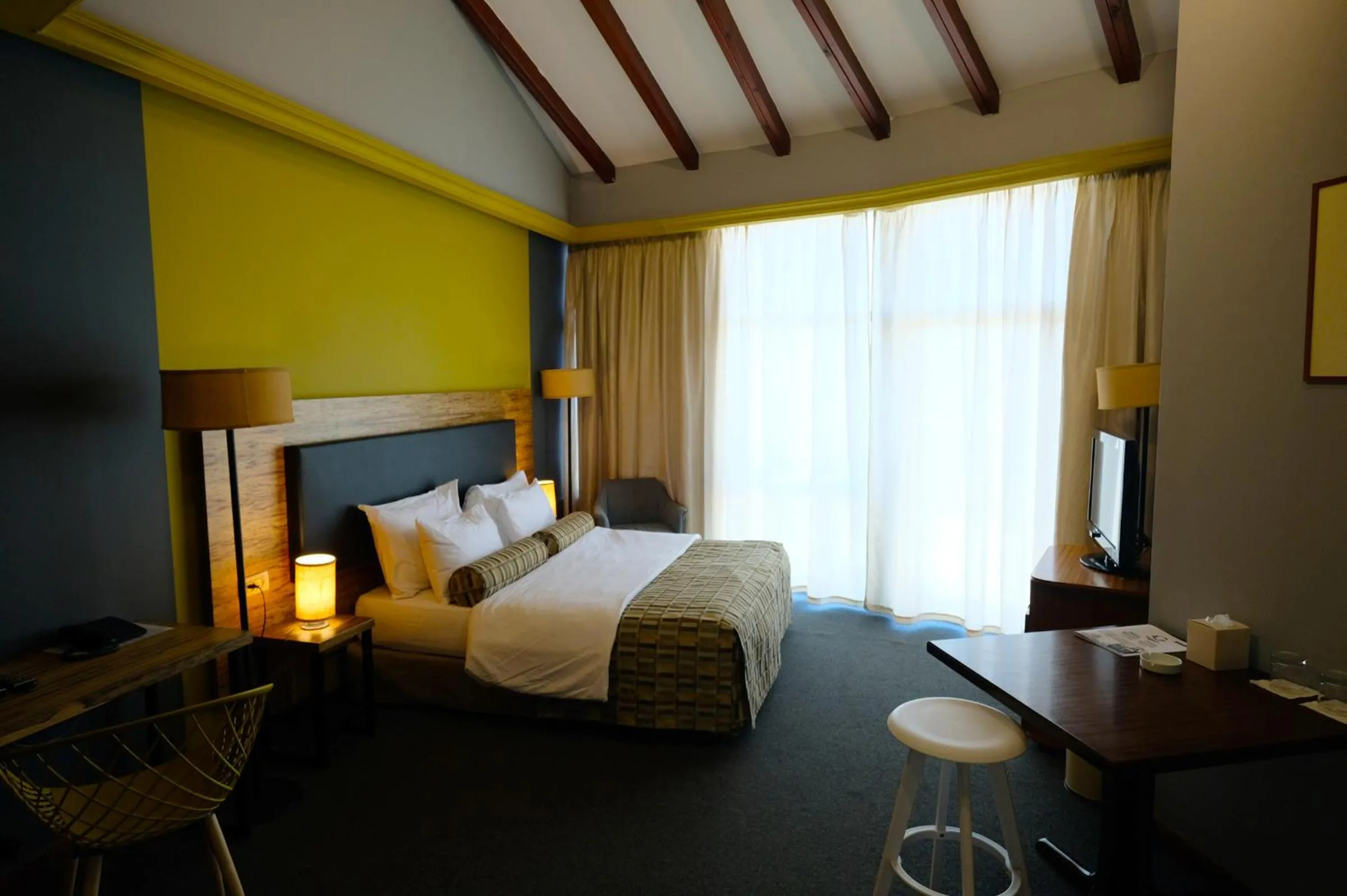 Bed in Royal Court Hotel