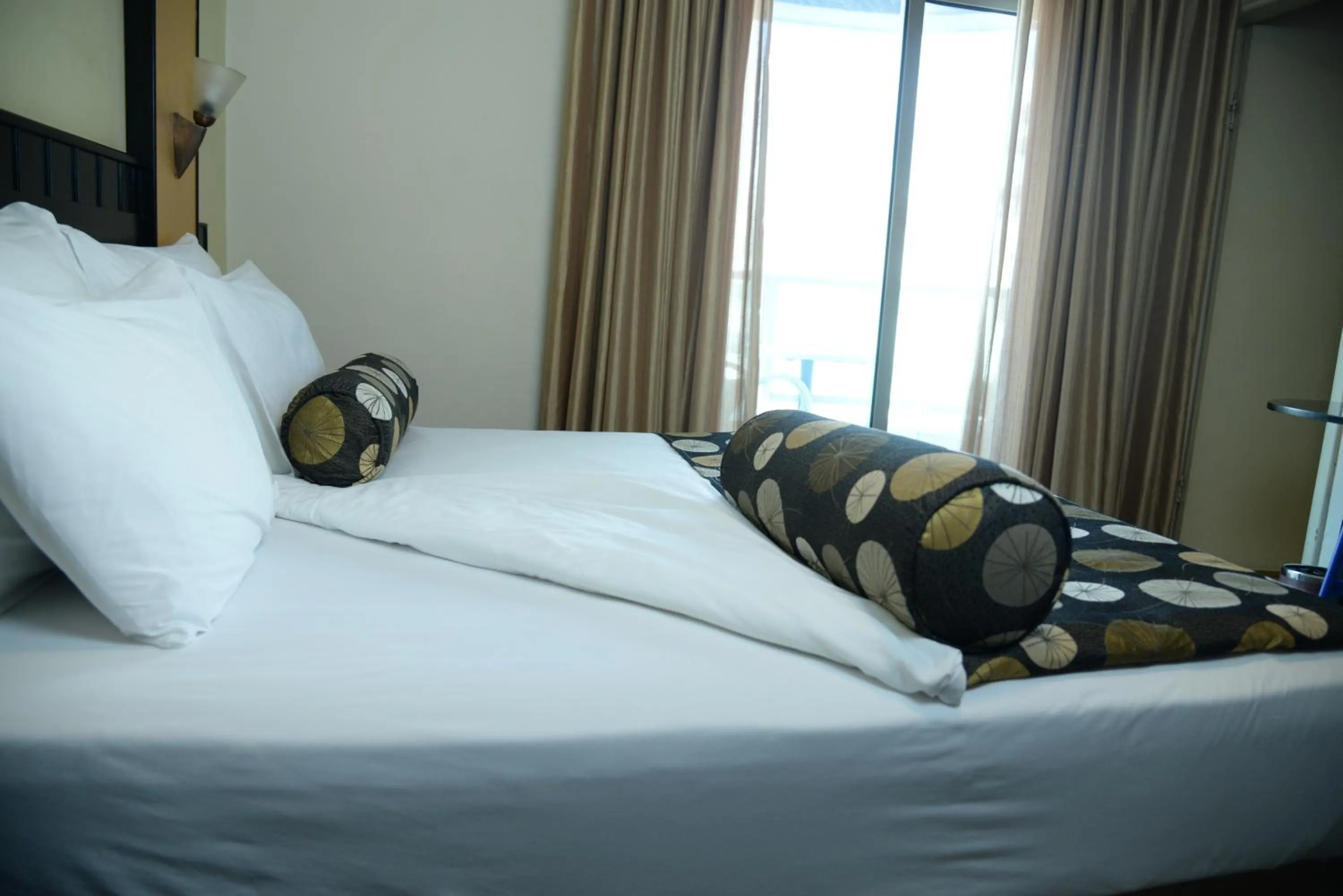 Bed in Royal Court Hotel