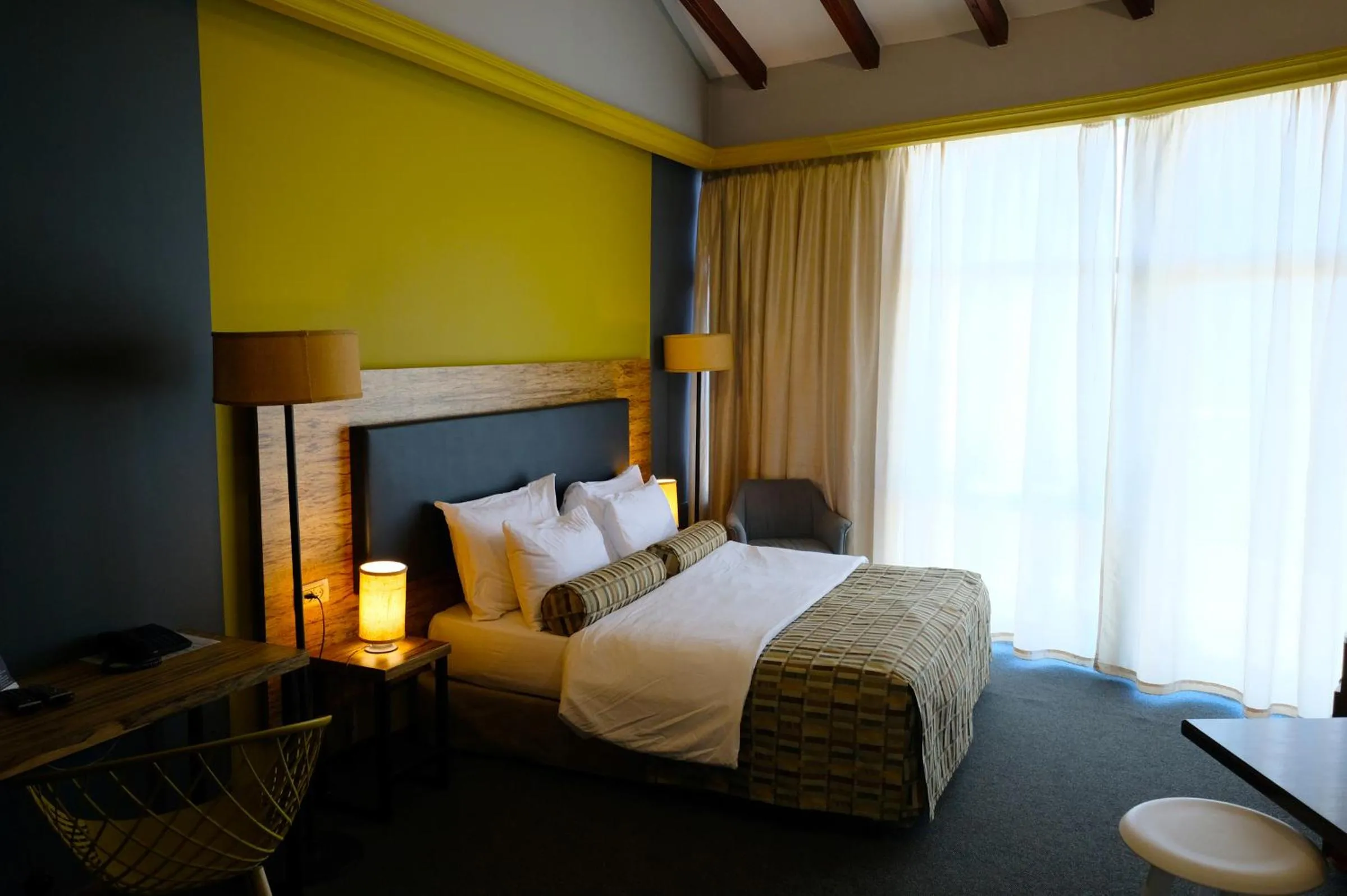 Bed in Royal Court Hotel