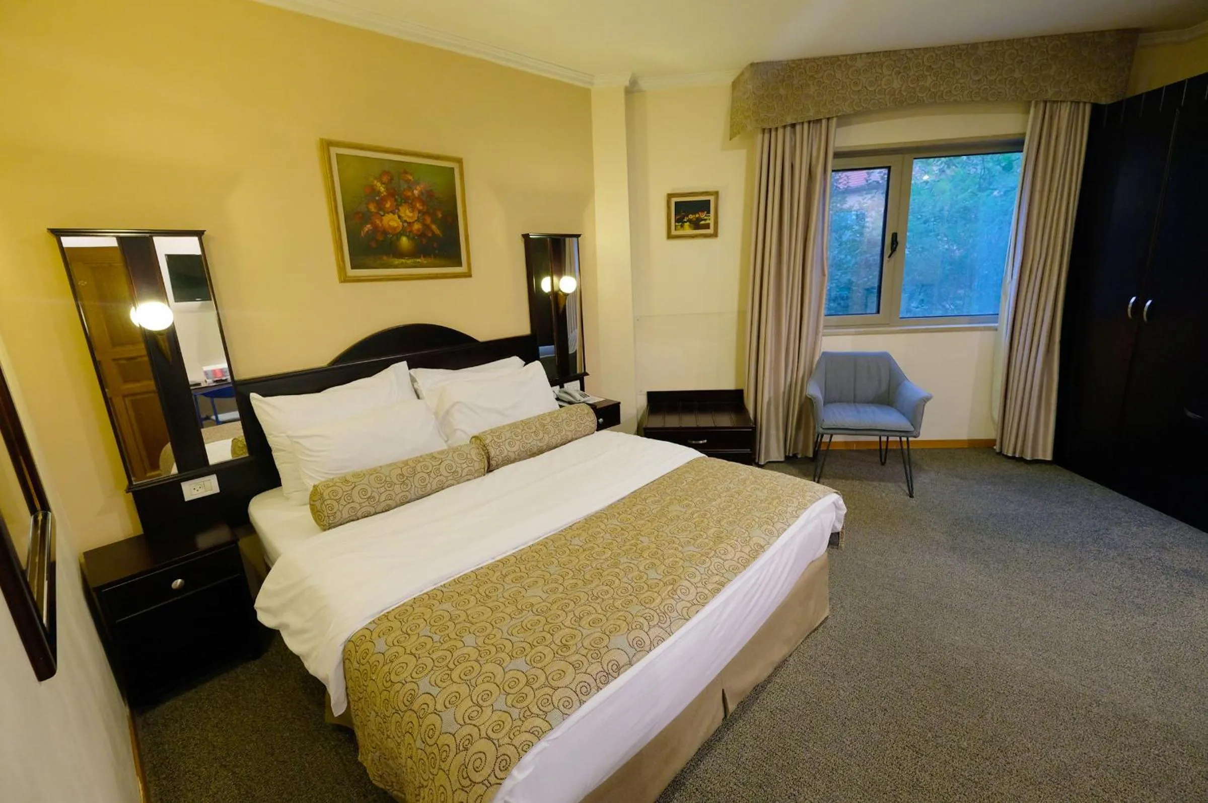 Bed in Royal Court Hotel