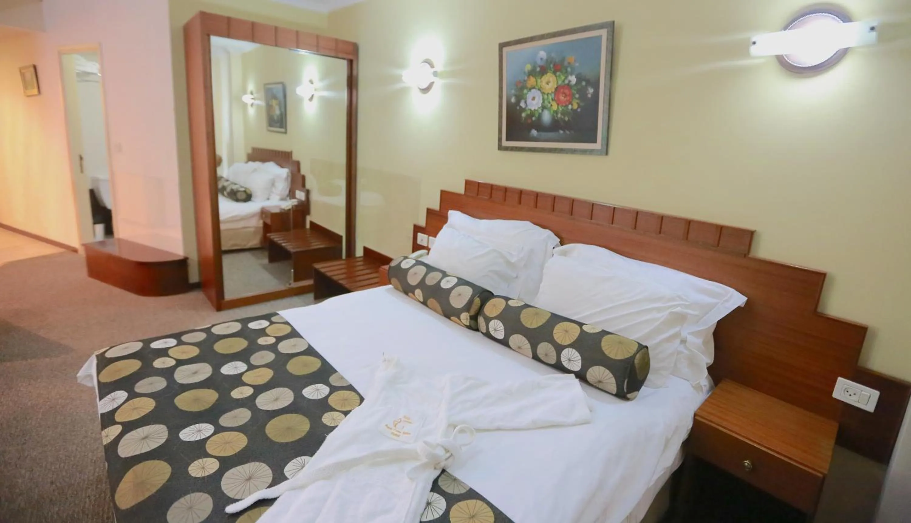 Bed in Royal Court Hotel