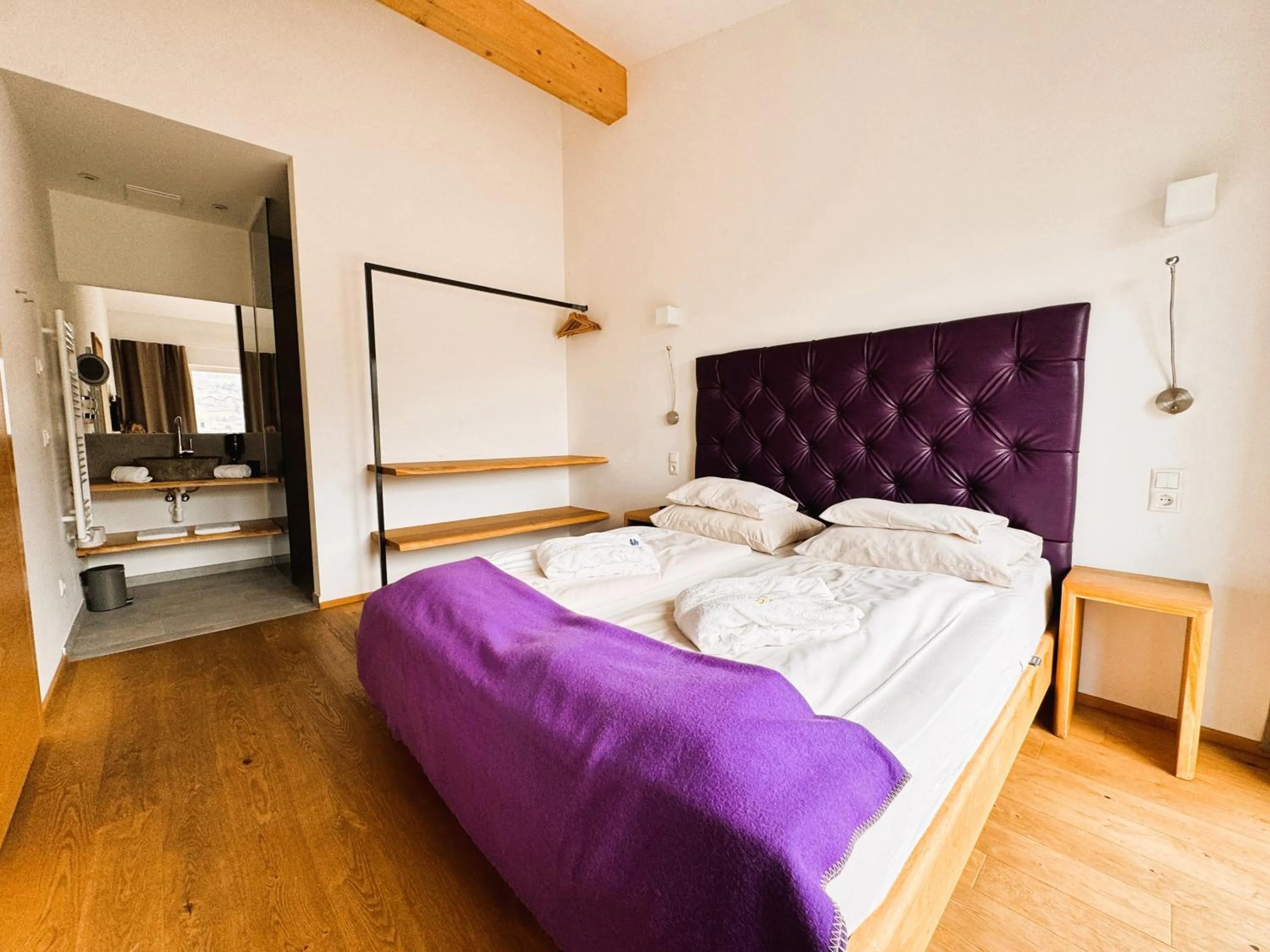 Bed in Boutique Aparthotel Chalets Coburg