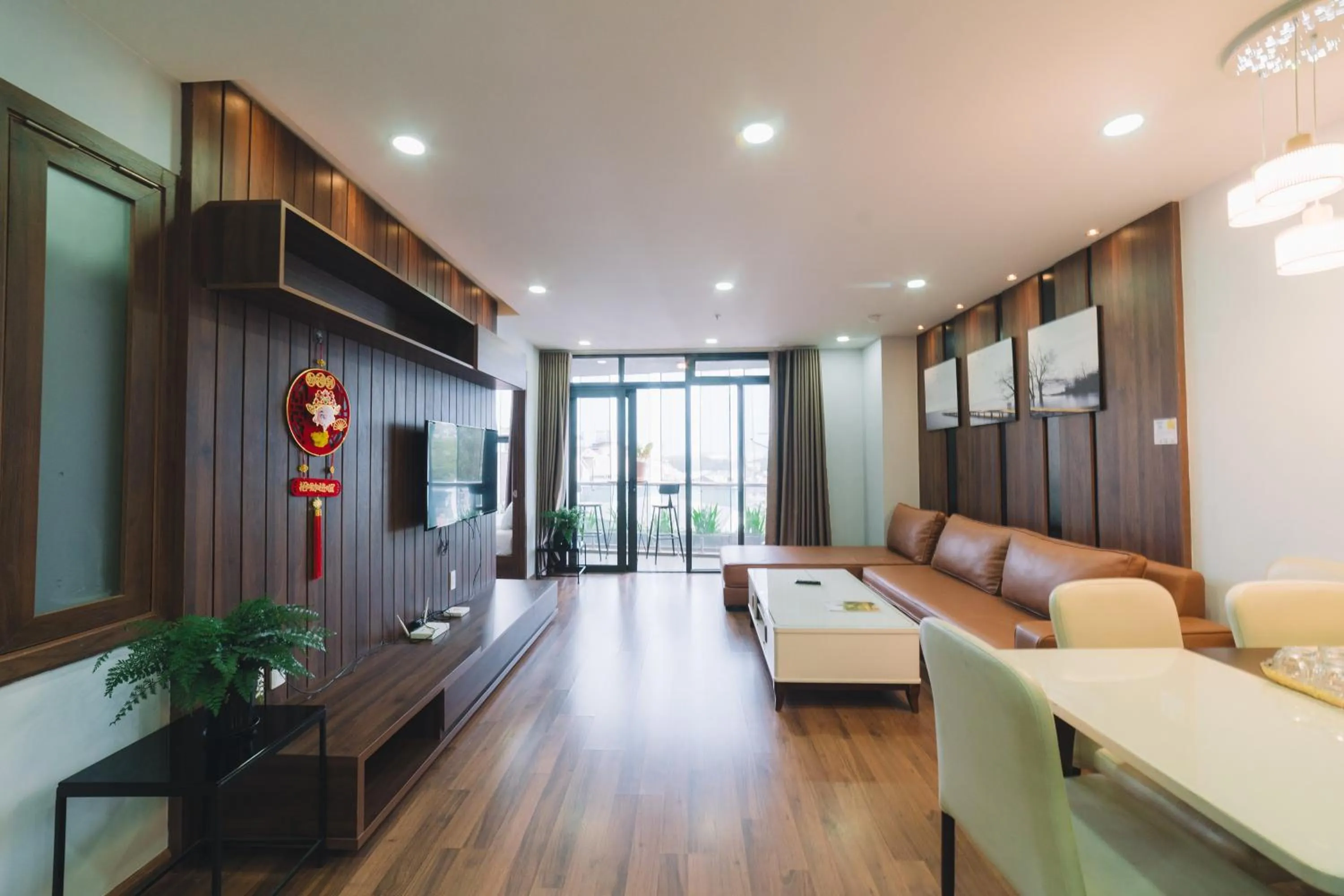 Communal lounge/ TV room, Bed in Dalat Center Residence