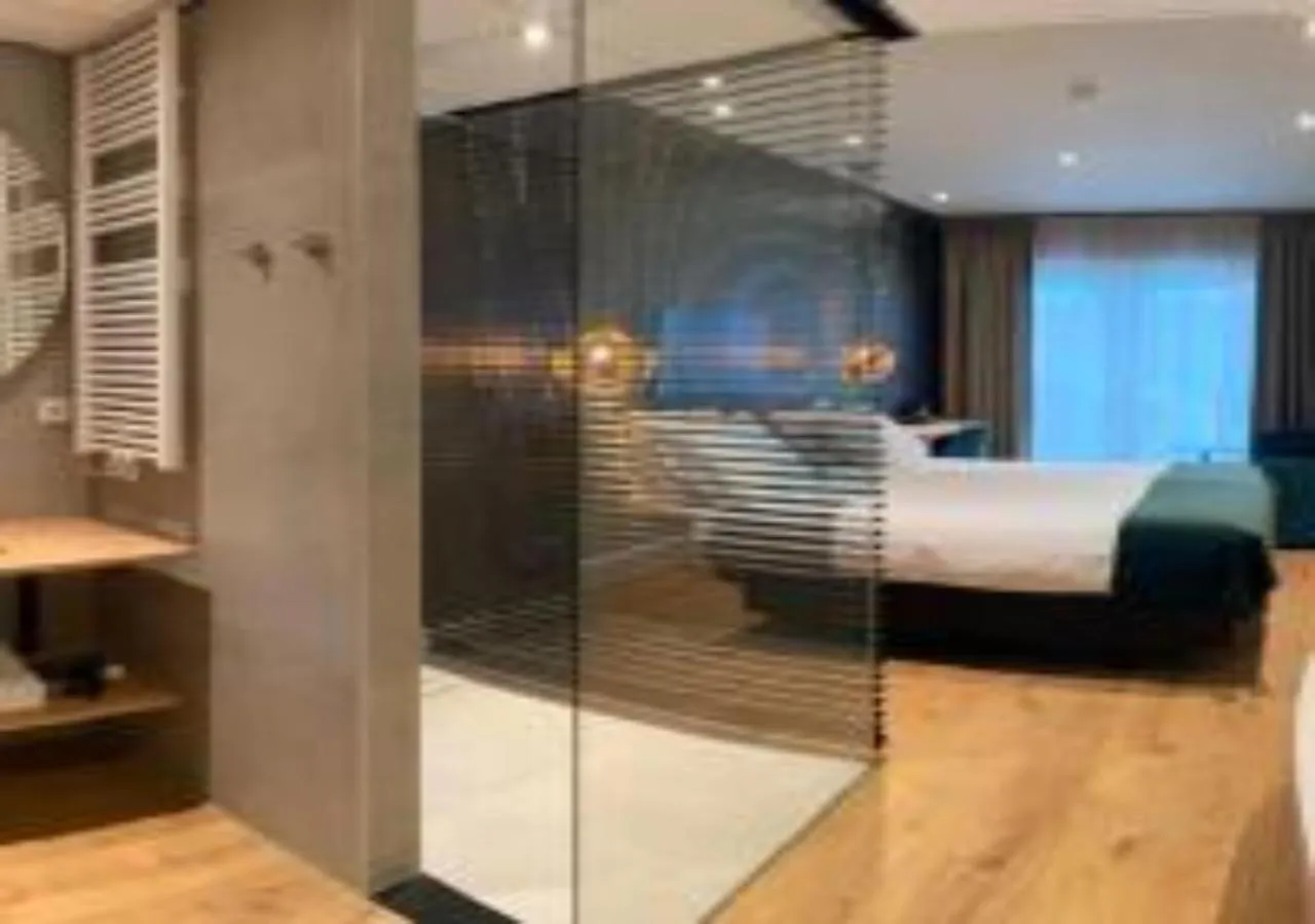 Bed in Hotel Sanders de Paauw