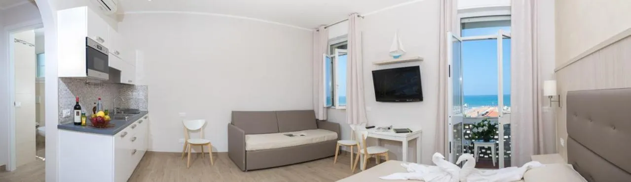 Communal lounge/ TV room in Hotel Biagi & Residence