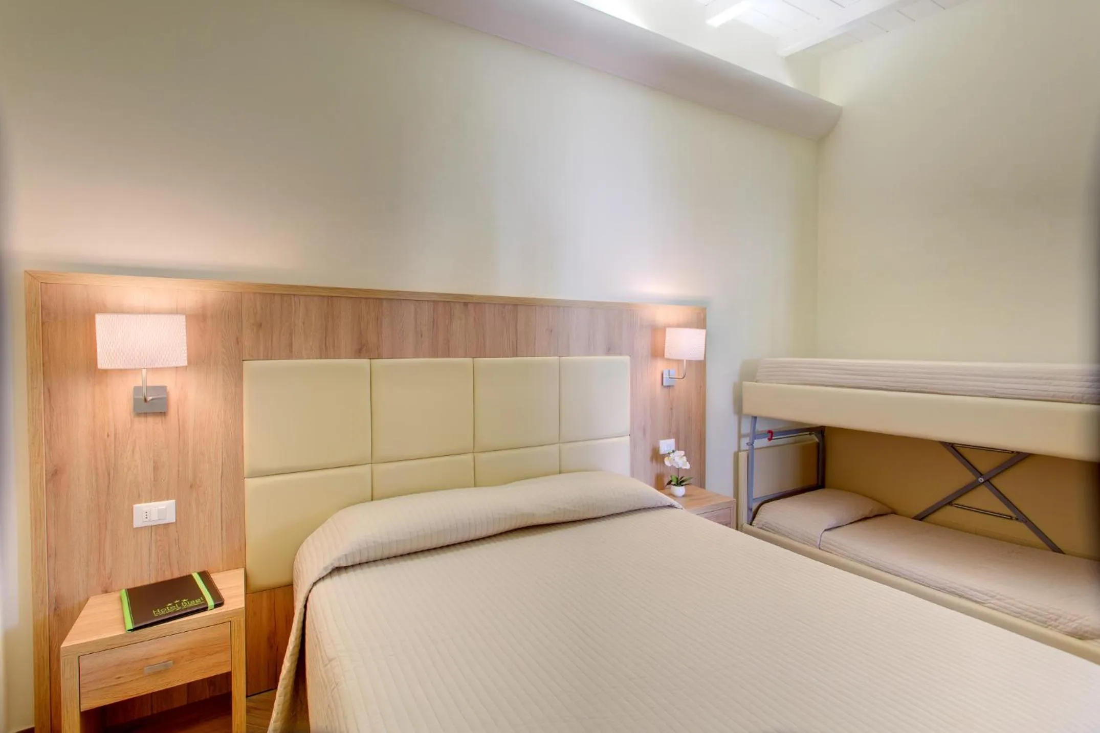 Bed in Hotel Biagi & Residence