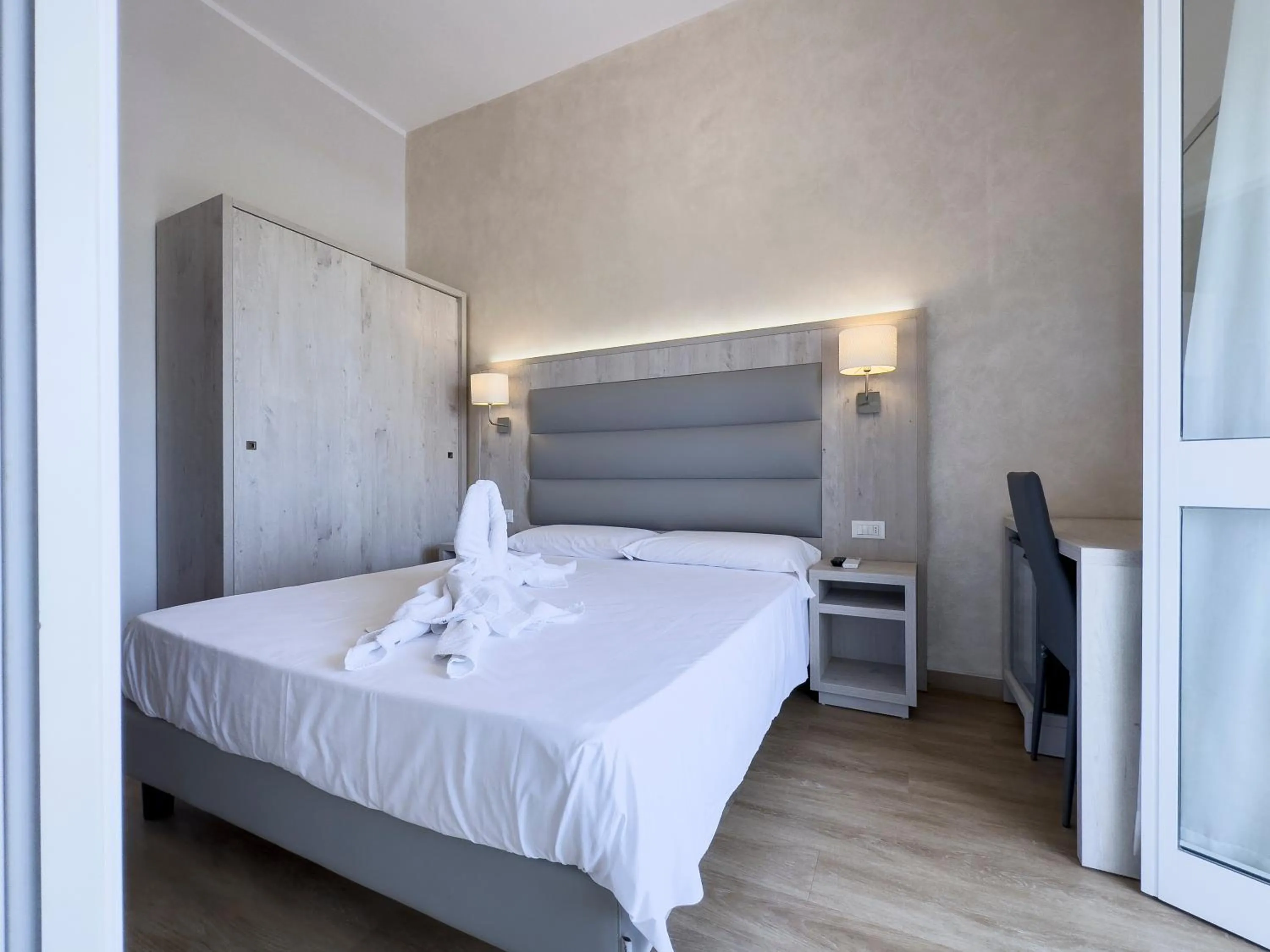 Bed in Hotel Biagi & Residence