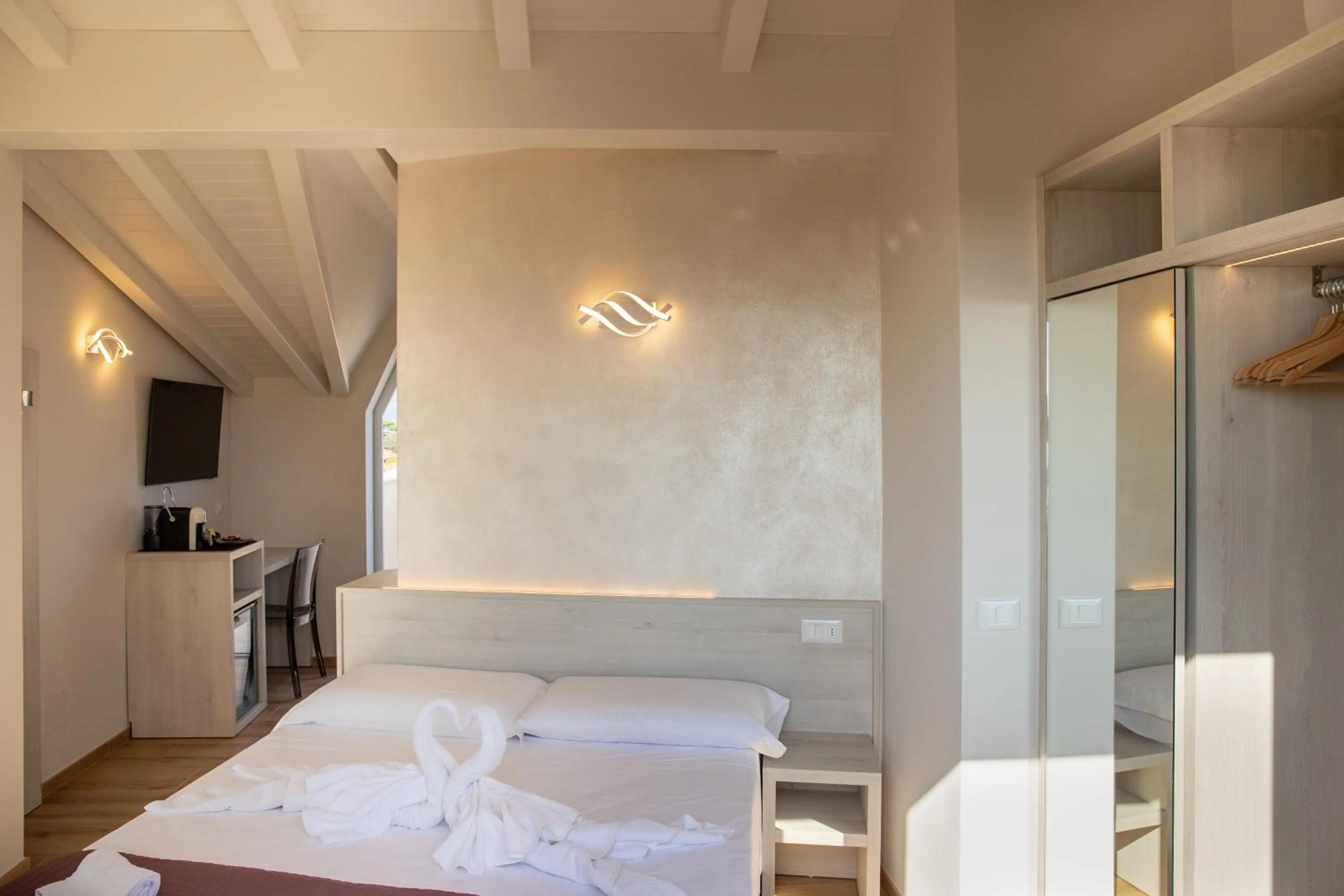 Bed in Hotel Biagi & Residence