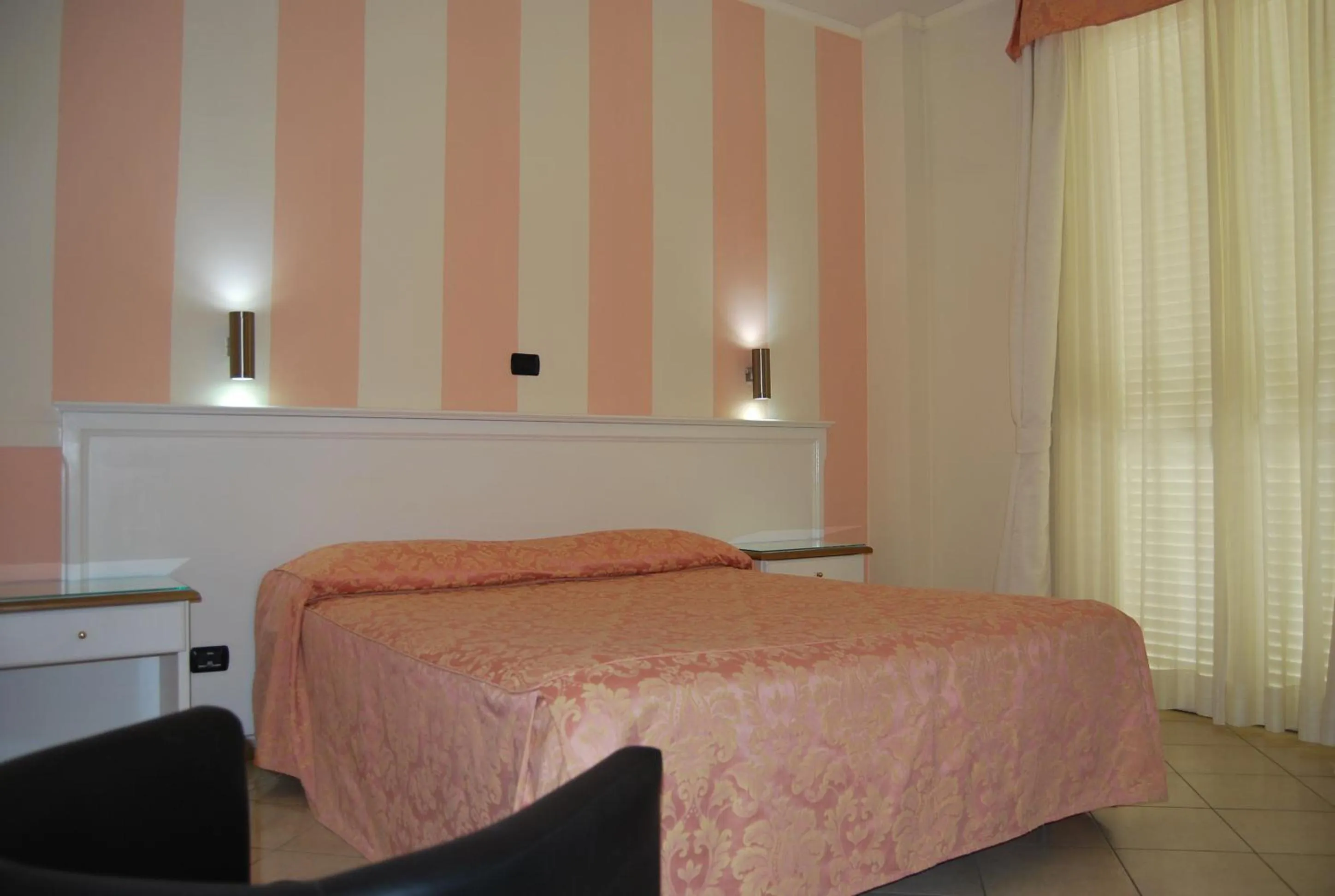 Bed in Hotel Coluccini