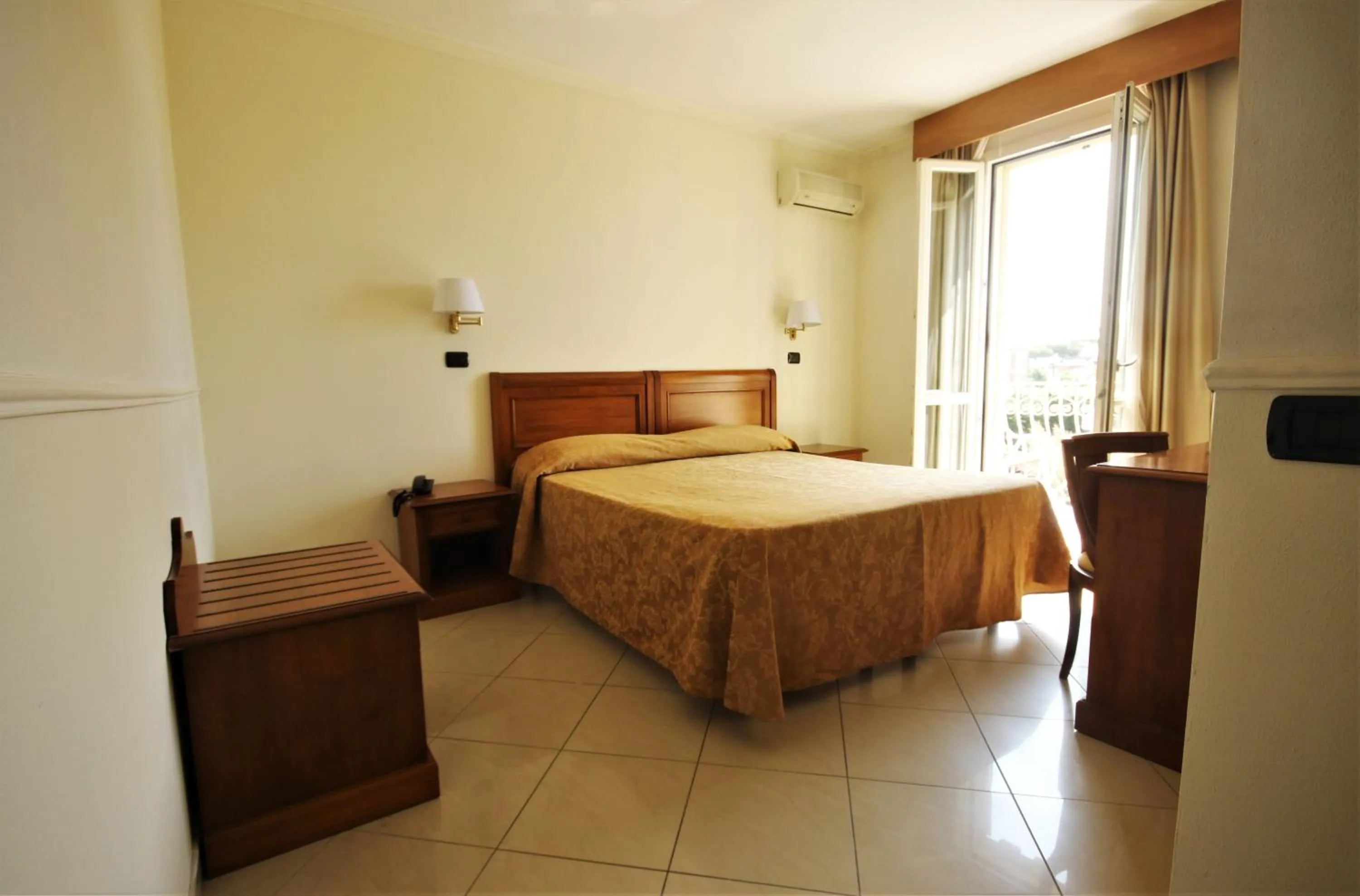 Bed in Hotel Coluccini