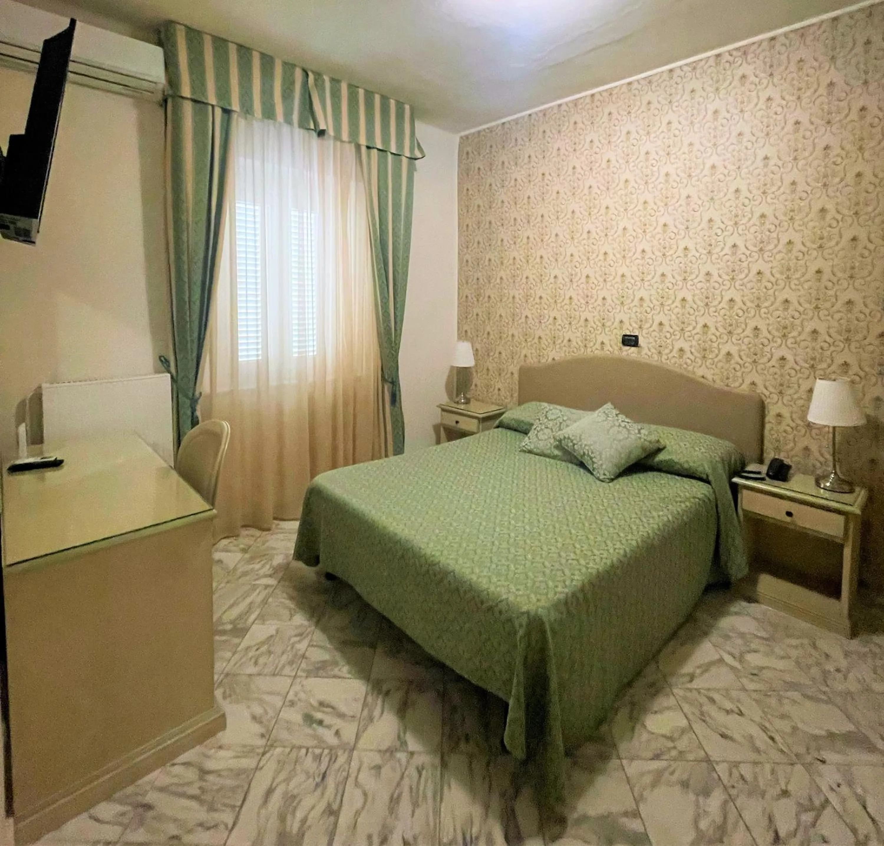 Bed in Hotel Coluccini