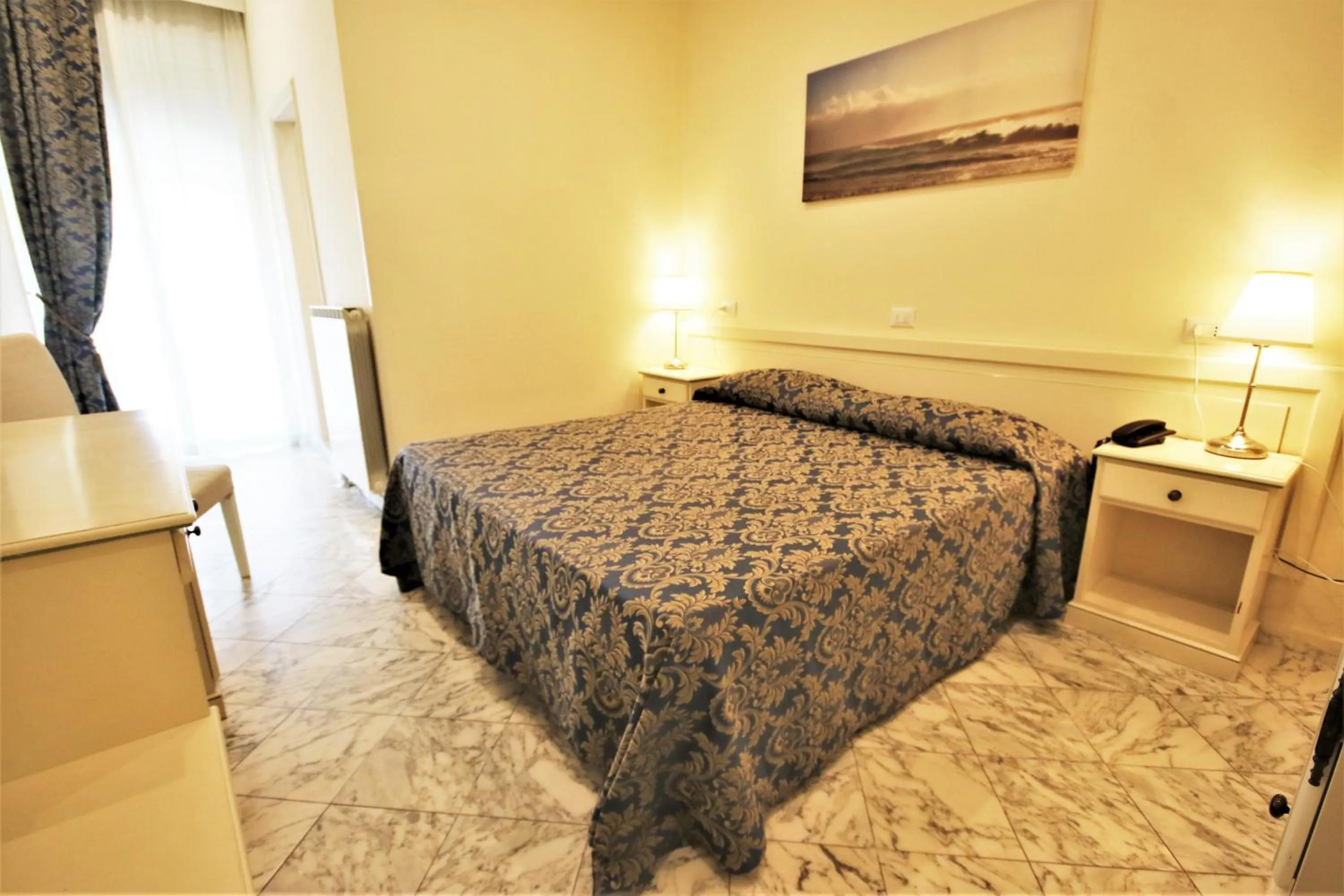 Bed in Hotel Coluccini