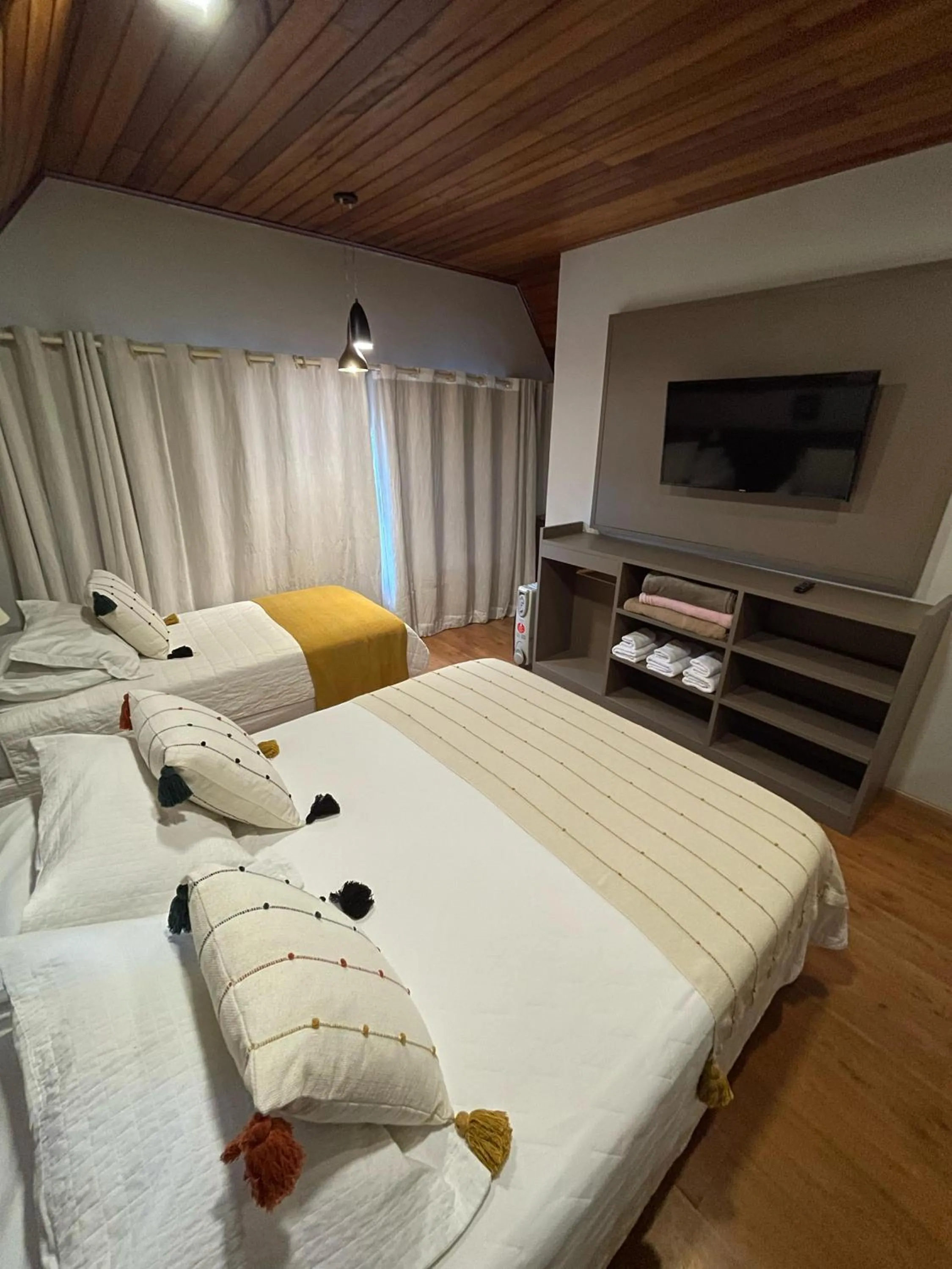 Bed in Pousada Cantinho da Serra