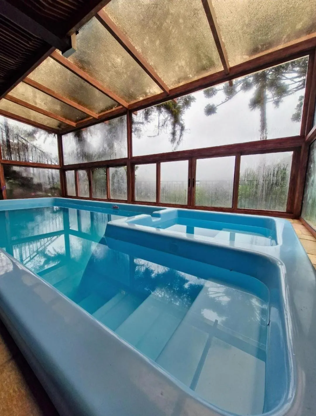 Swimming pool in Pousada Cantinho da Serra