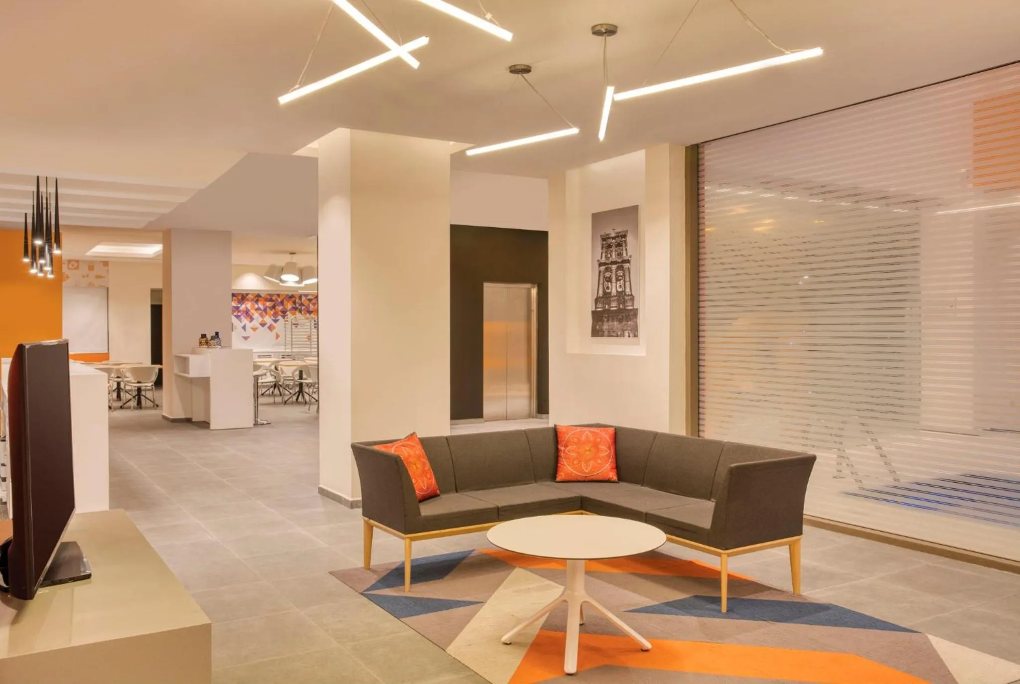 Living room in Fiesta Inn Express Puebla Explanada