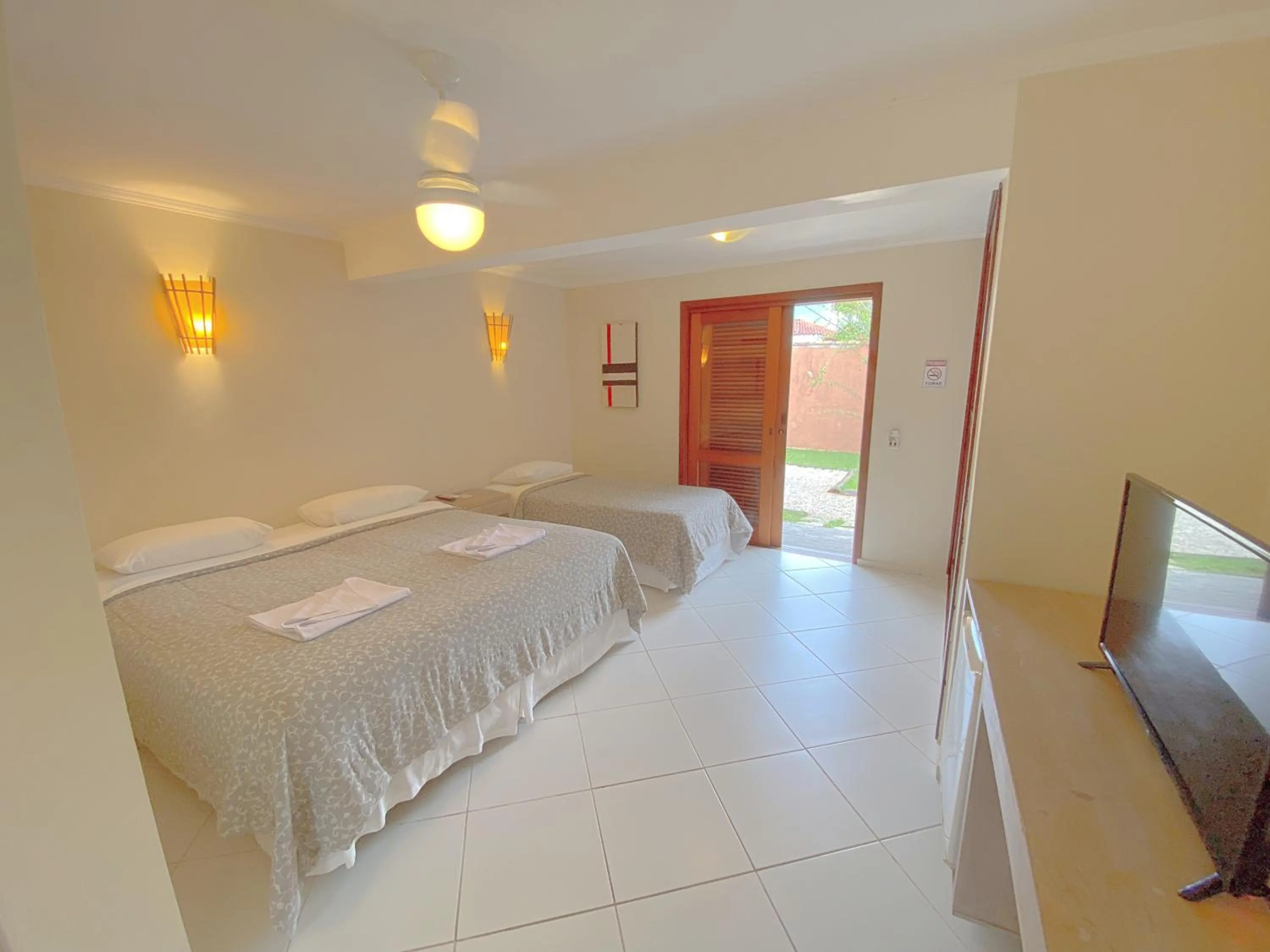 Property building, Bed in Pousada Montemar