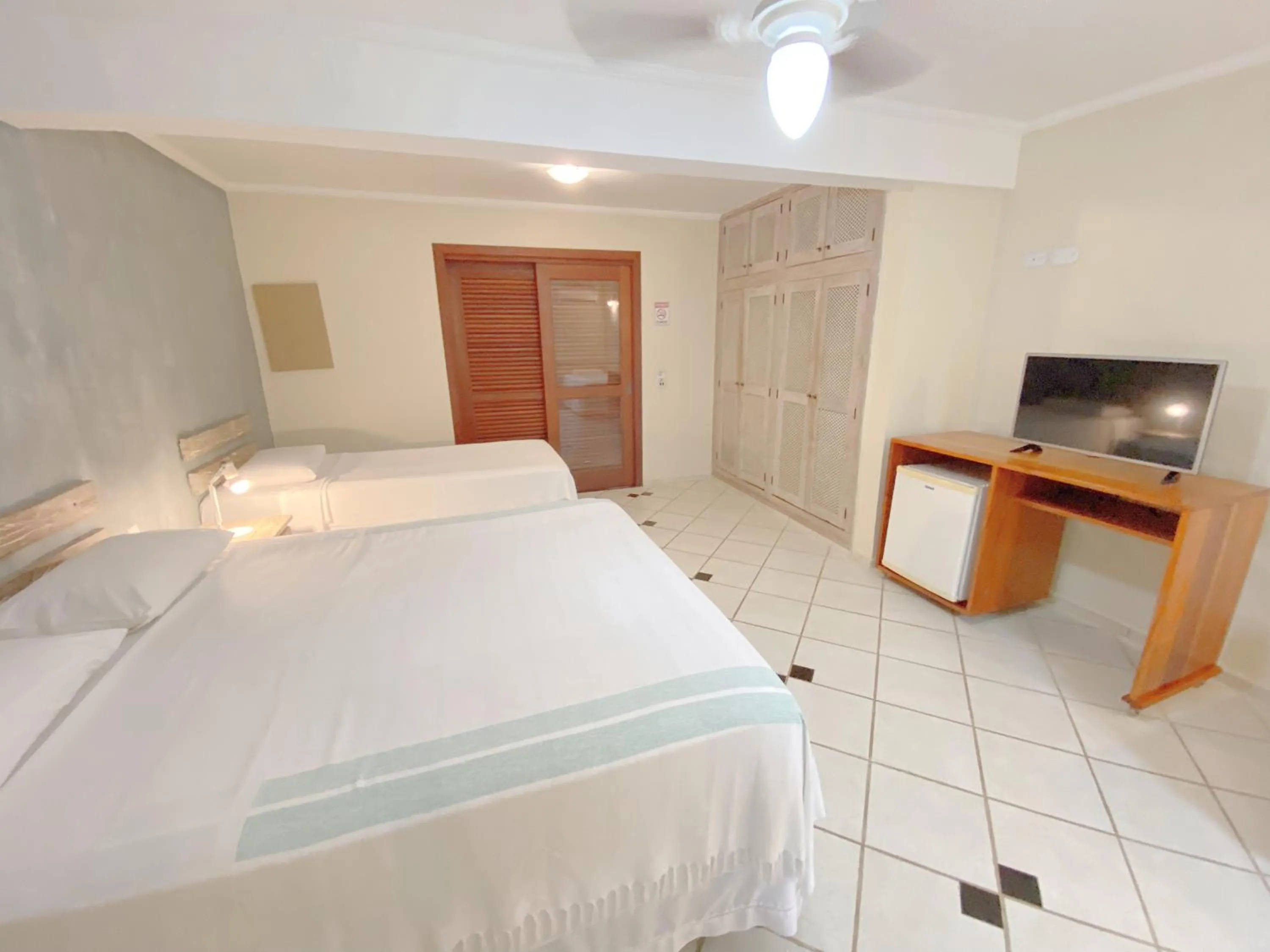 Property building, Bed in Pousada Montemar