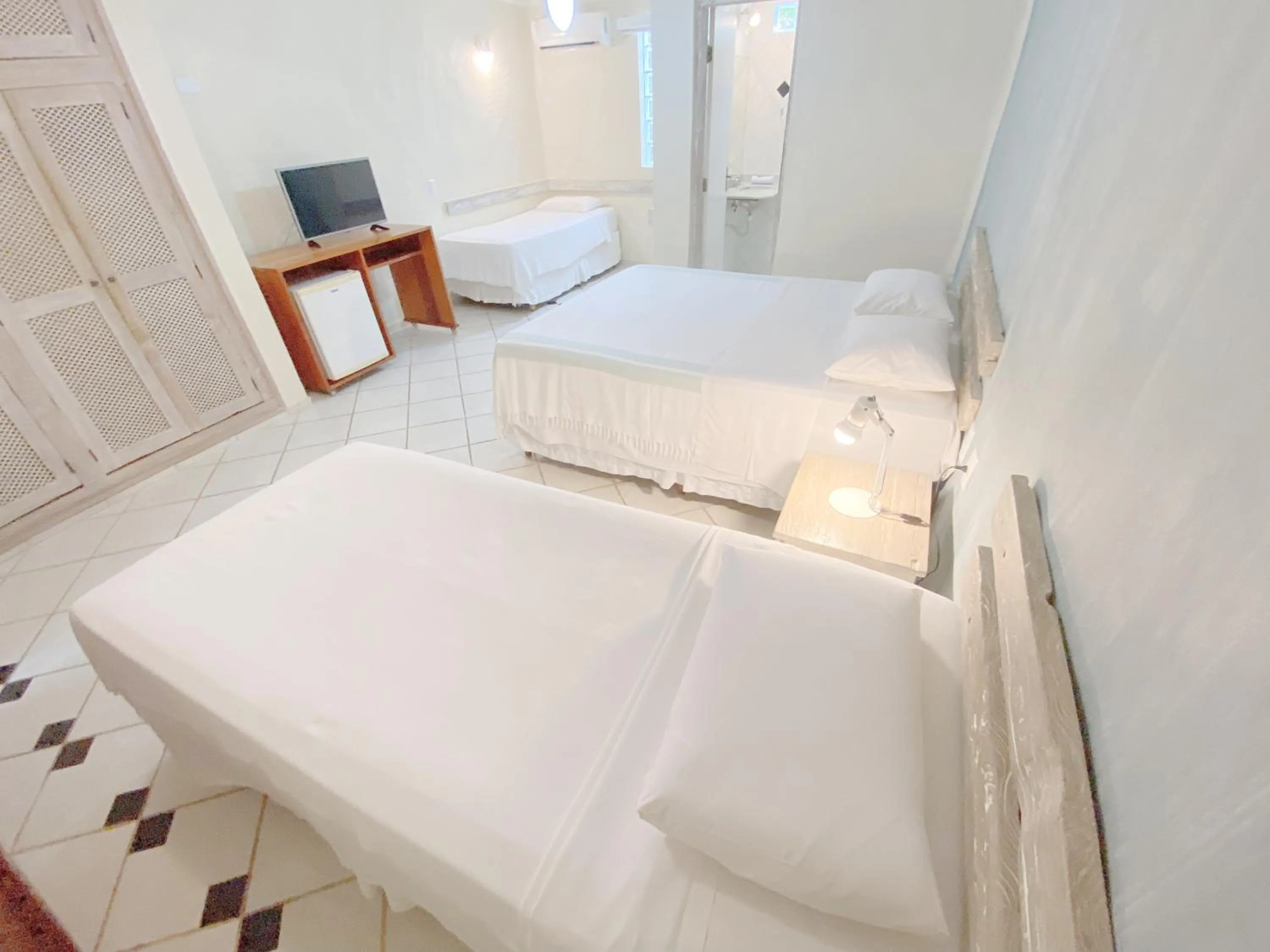 Property building, Bed in Pousada Montemar