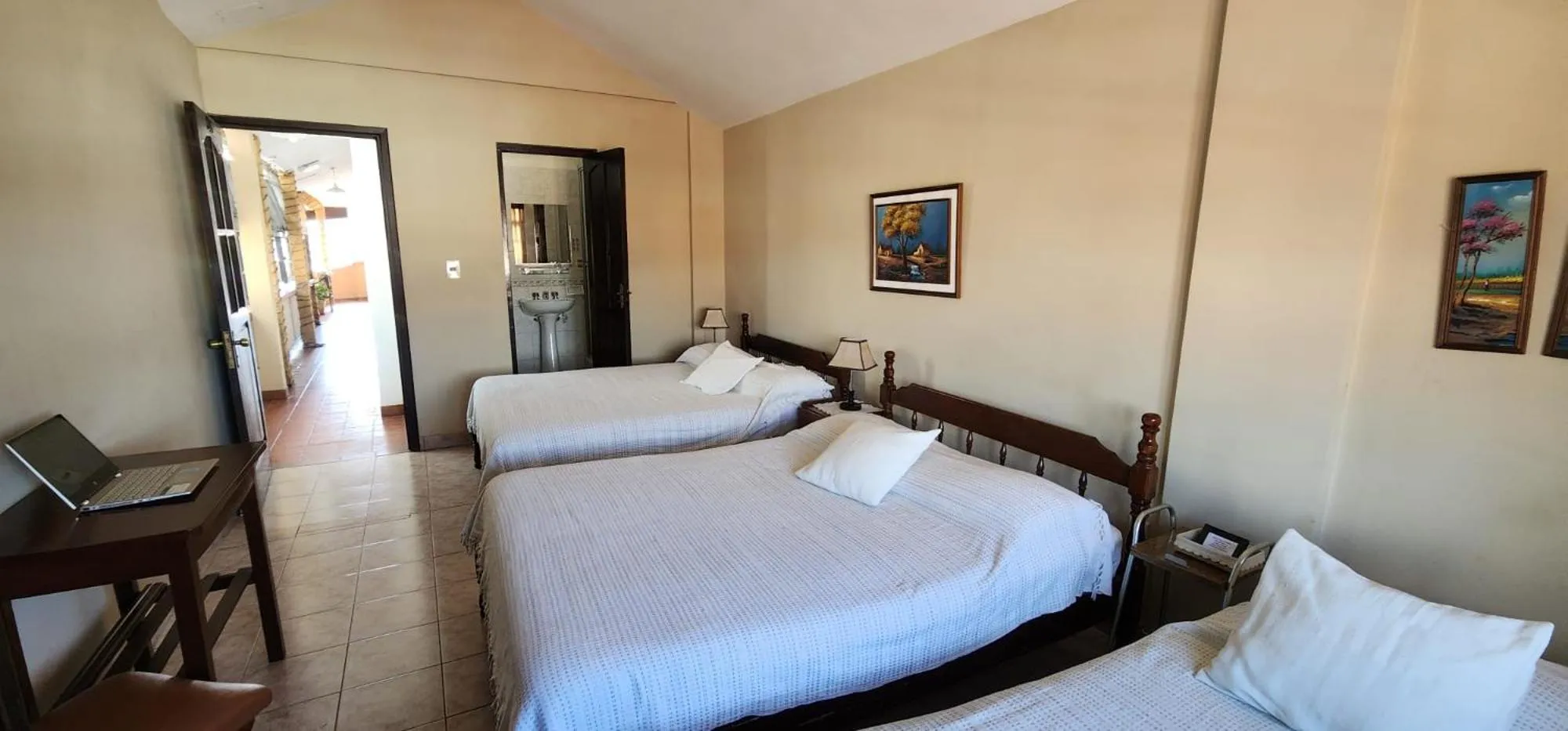 Seating area, Bed in Hotel Carmen