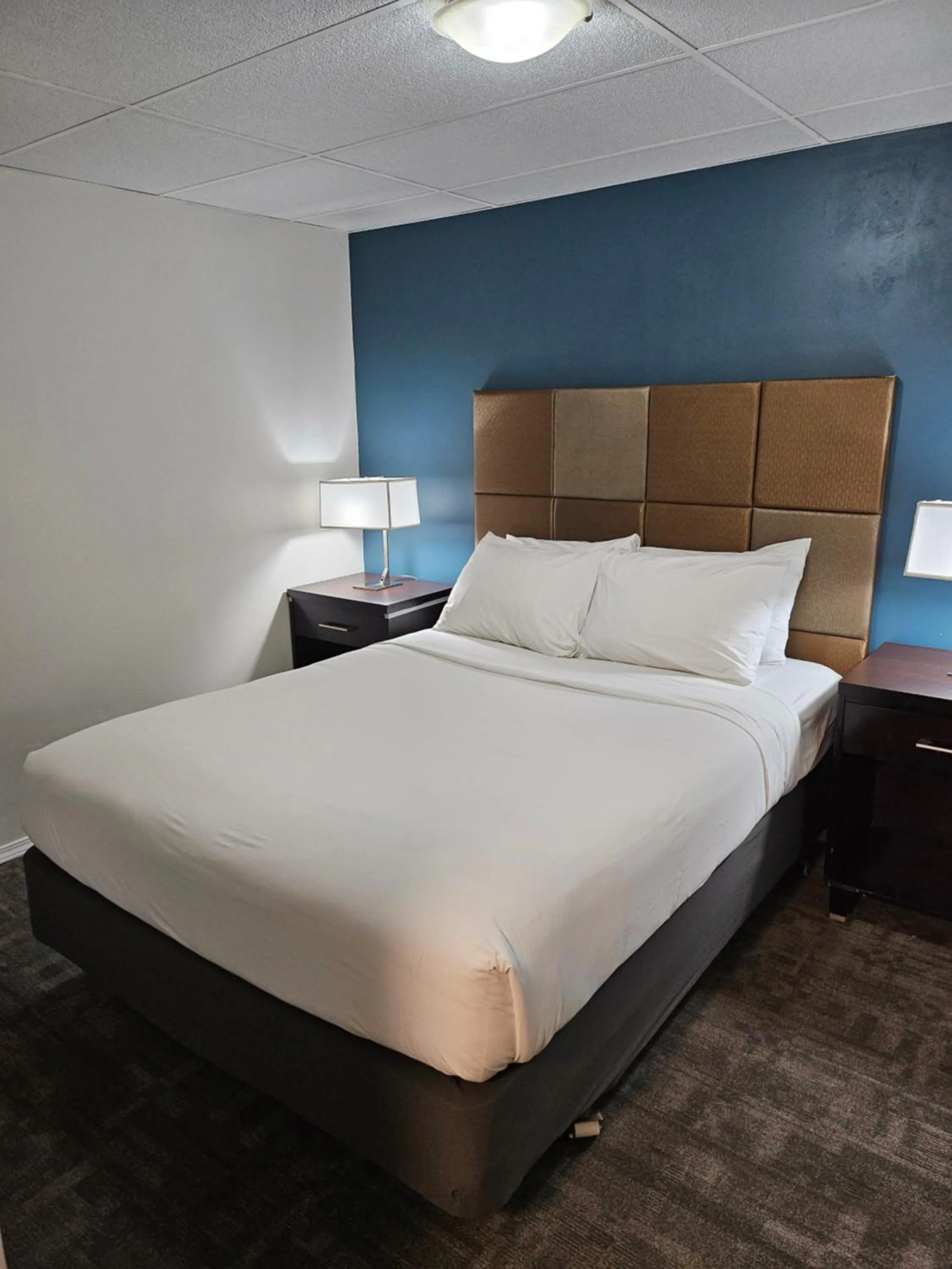 Bed in Shoreline Resort Condominiums