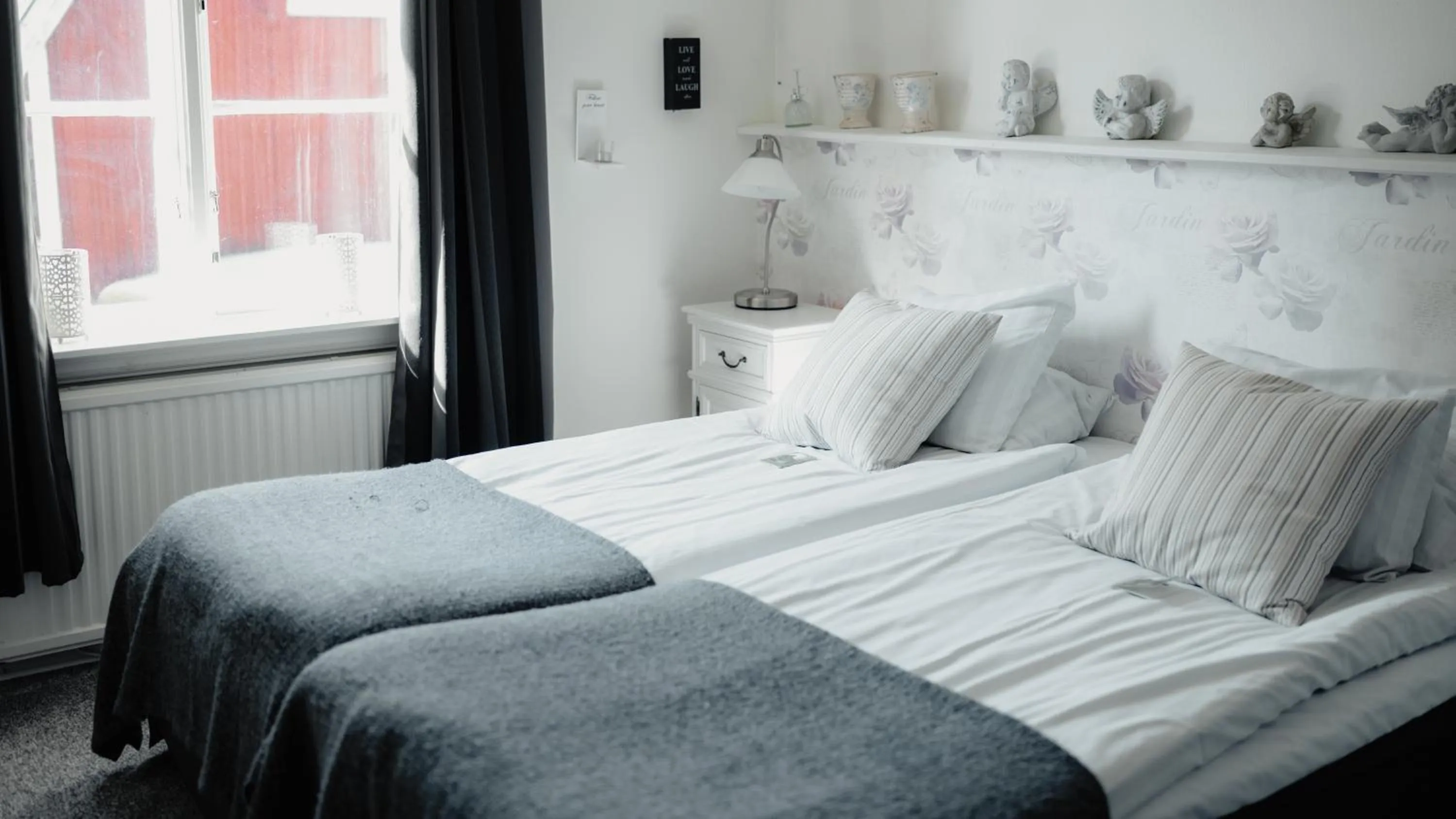 Photo of the whole room, Bed in STF Korrö Gårdshotell