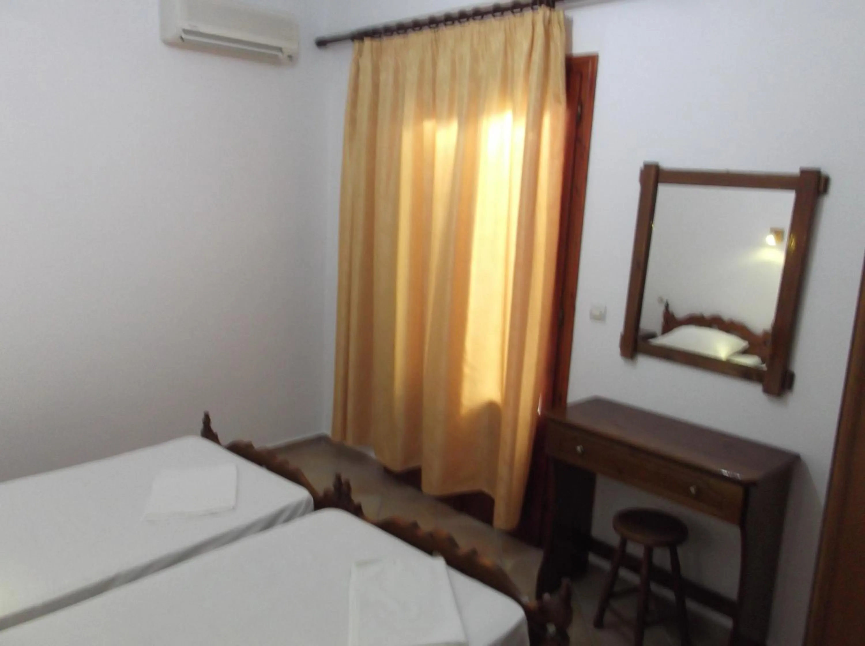 Decorative detail, Bed in Stella Apartments