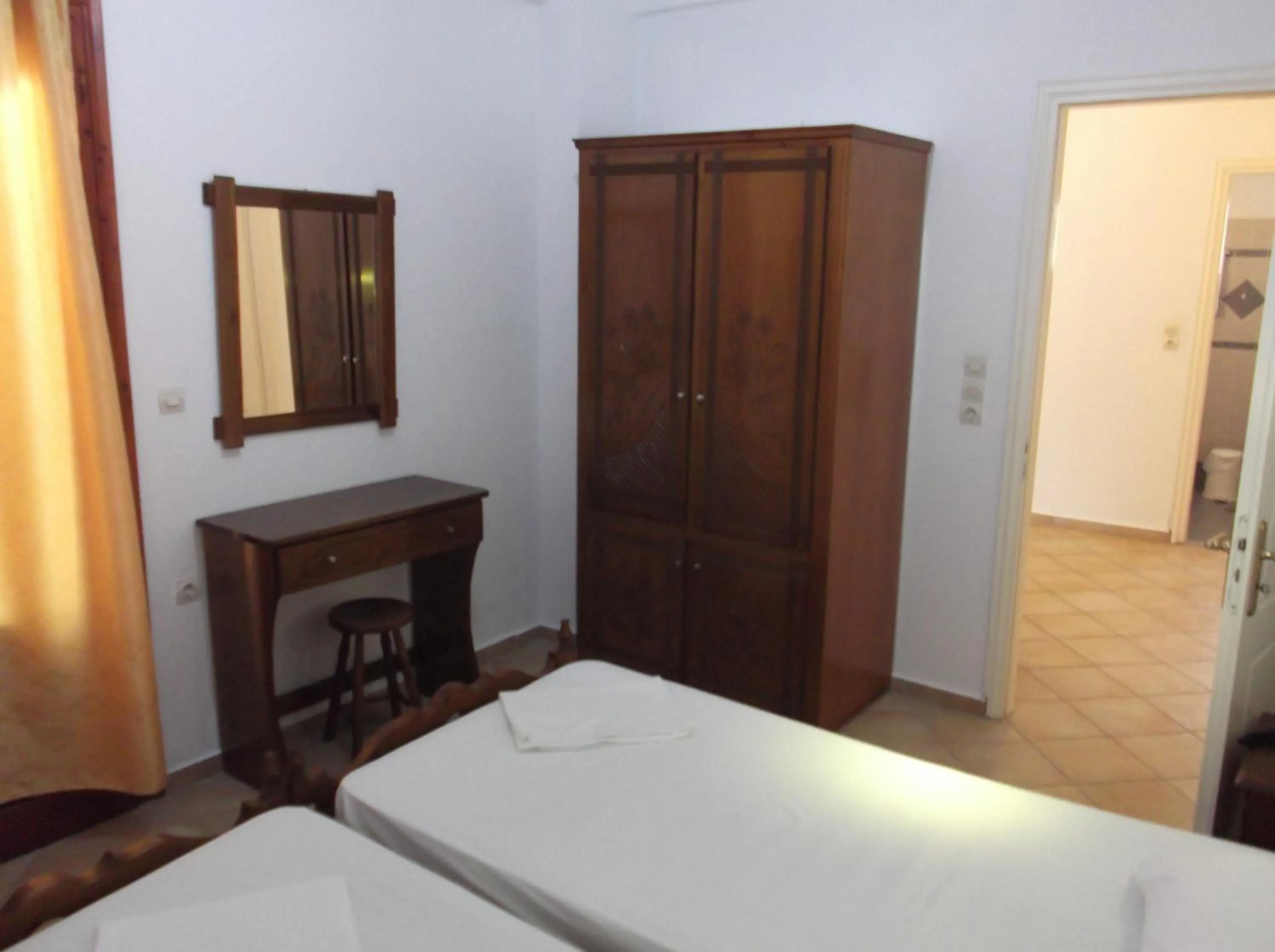 Decorative detail, Bed in Stella Apartments