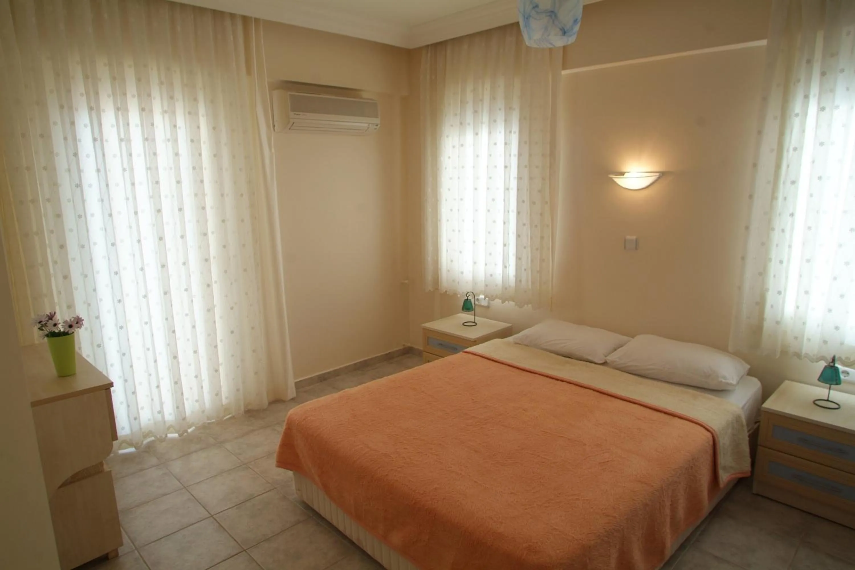 Bed in Sea Breeze Hotel and Apartments