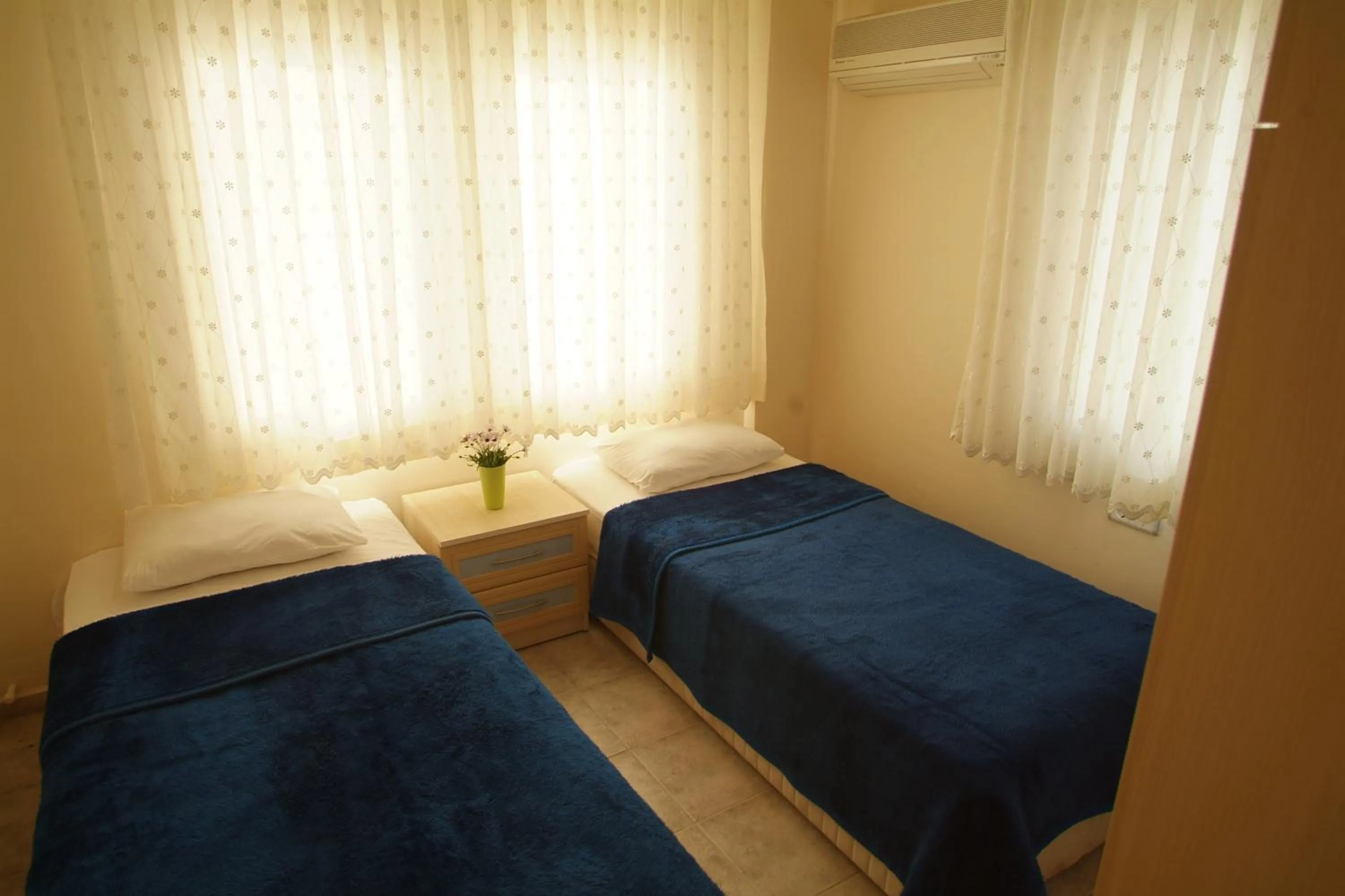 Bedroom, Bed in Sea Breeze Hotel and Apartments