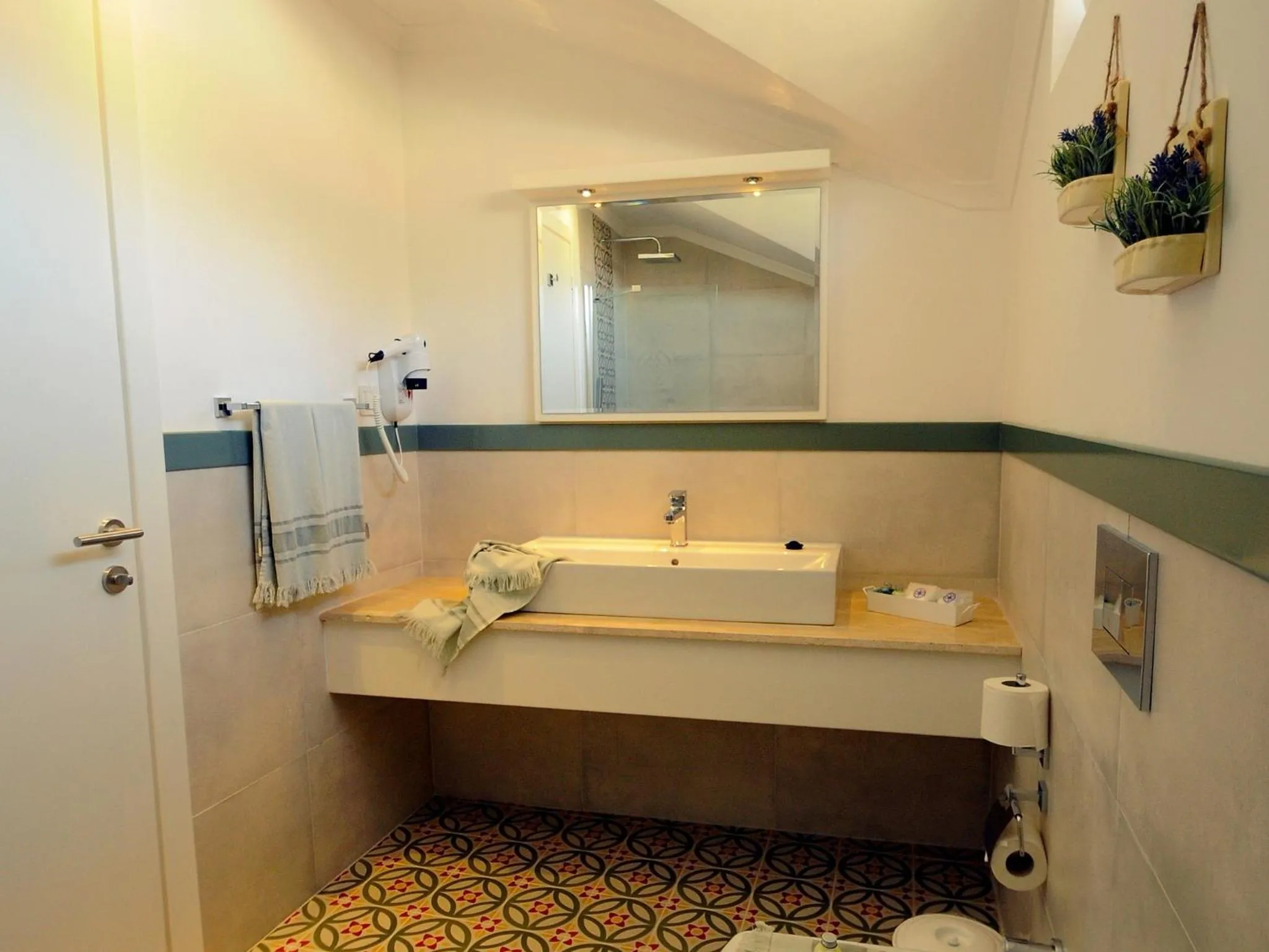 Bathroom in Sea Breeze Hotel and Apartments