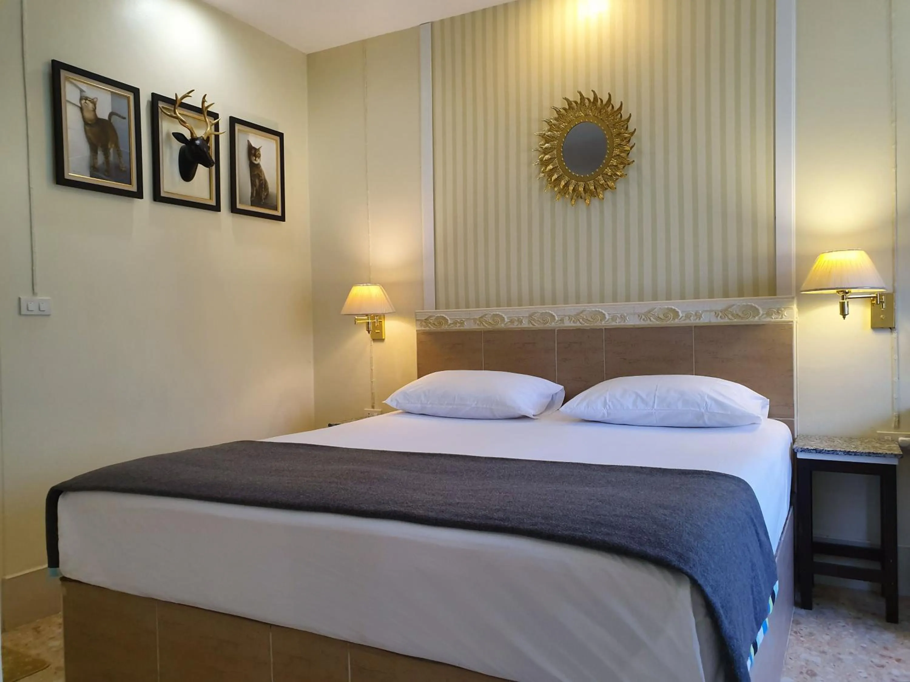 Bed in Holiday Village And Natural Garden Resort