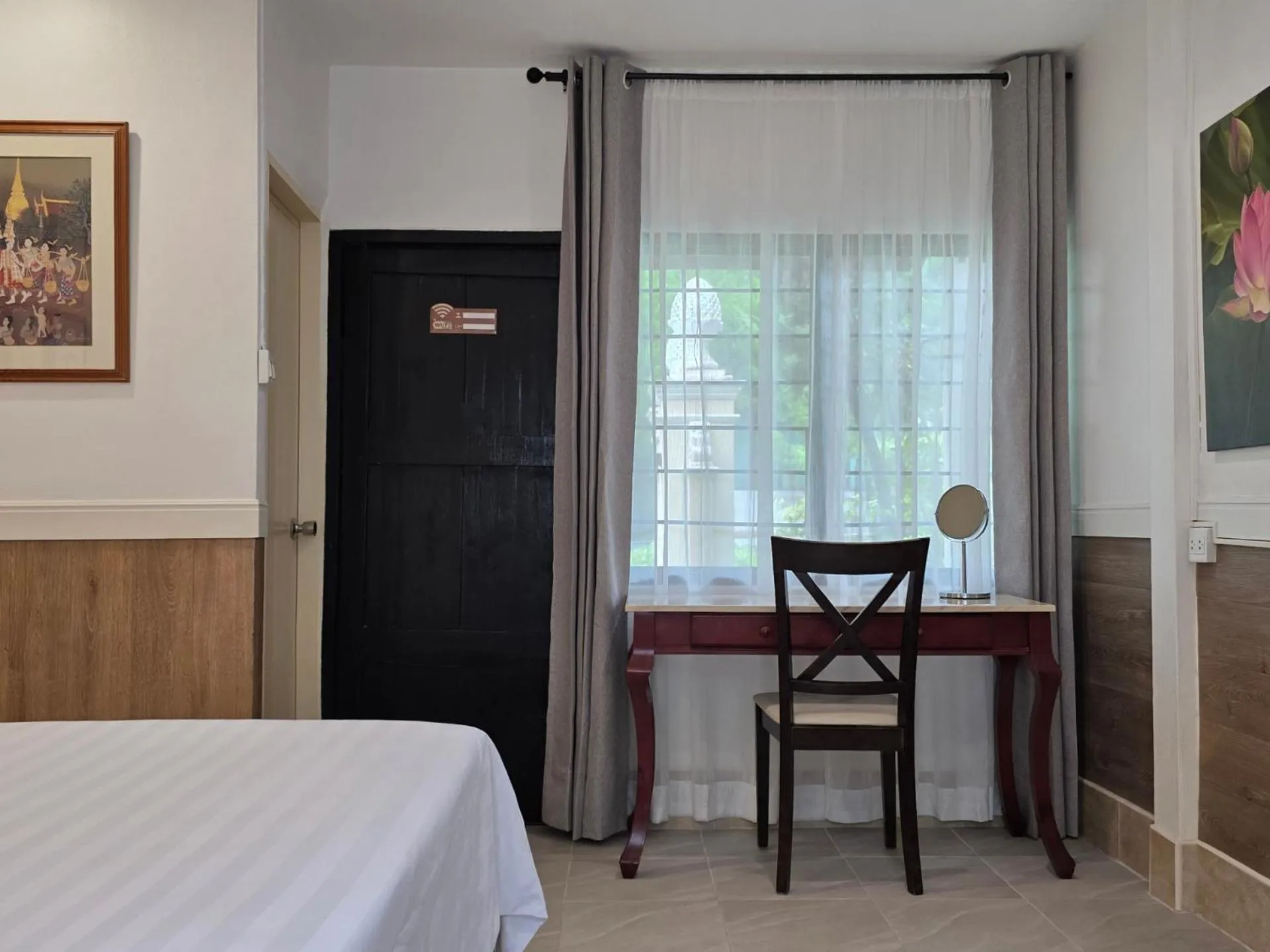 Bed in Holiday Village And Natural Garden Resort