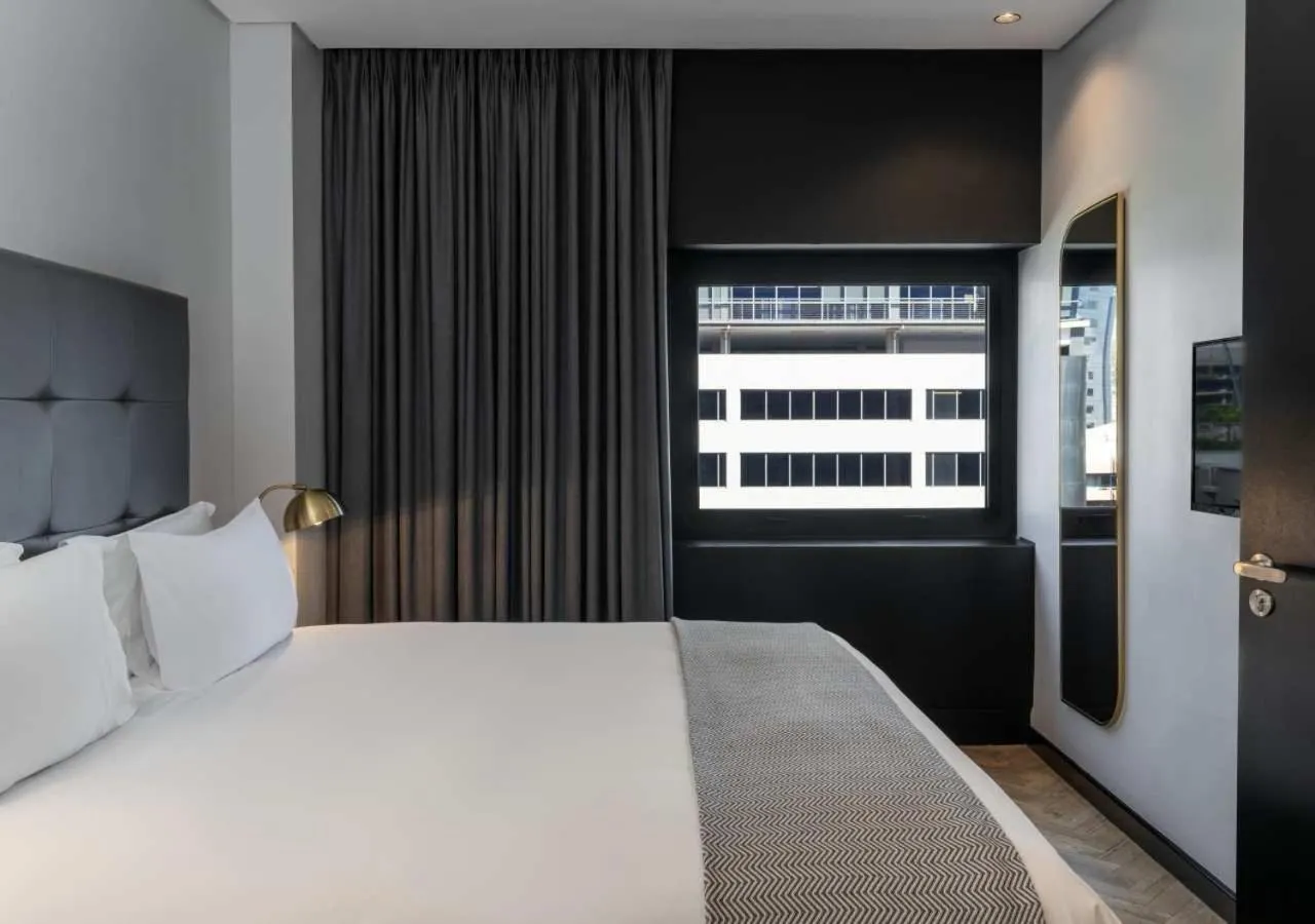 Bed in The Onyx Apartment Hotel by NEWMARK
