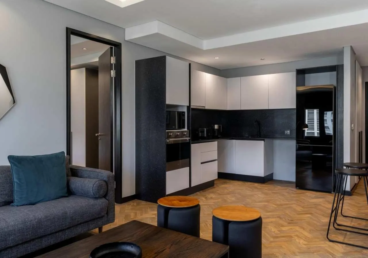 Kitchen or kitchenette in The Onyx Apartment Hotel by NEWMARK