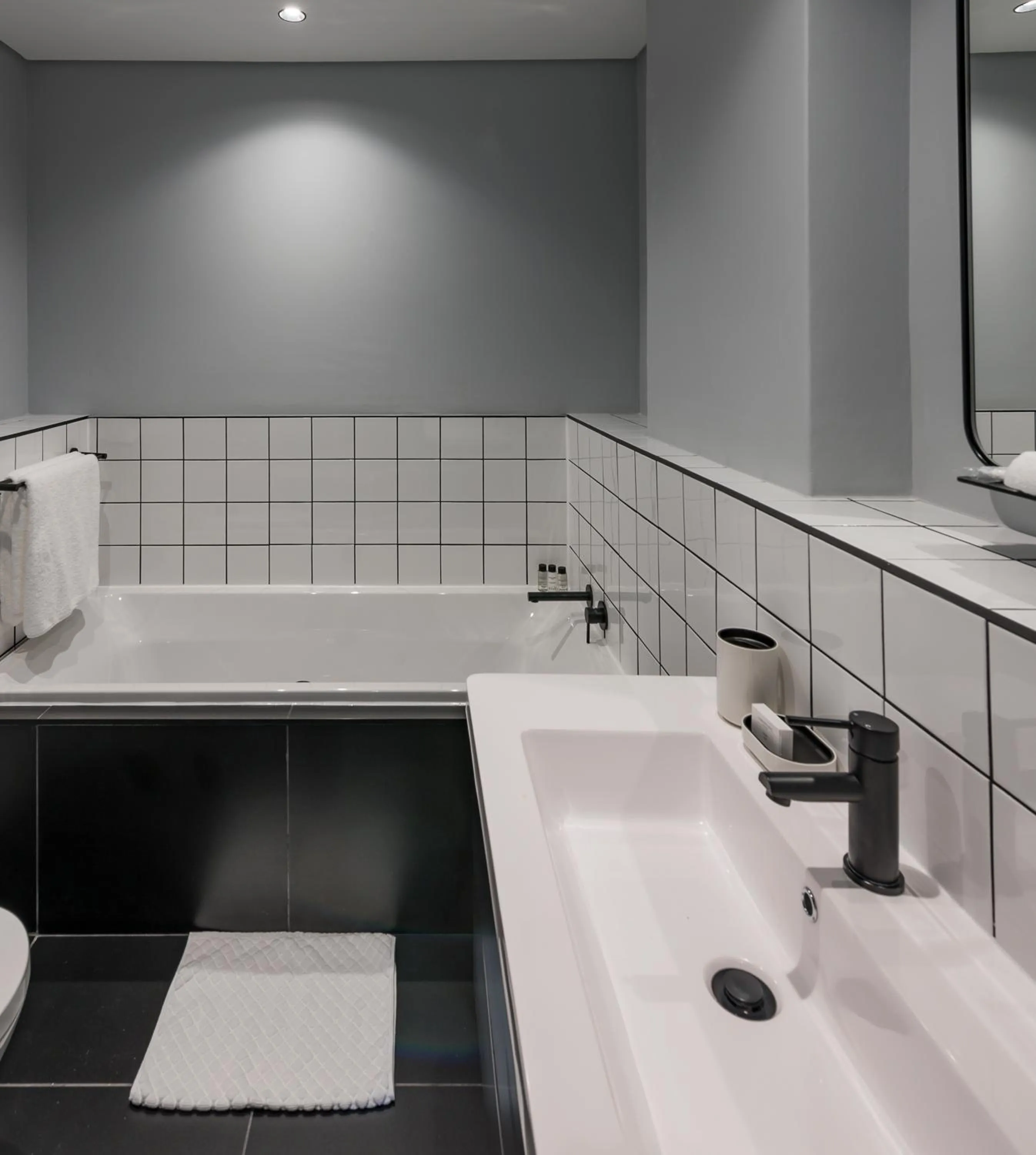 Bathroom in The Onyx Apartment Hotel by NEWMARK