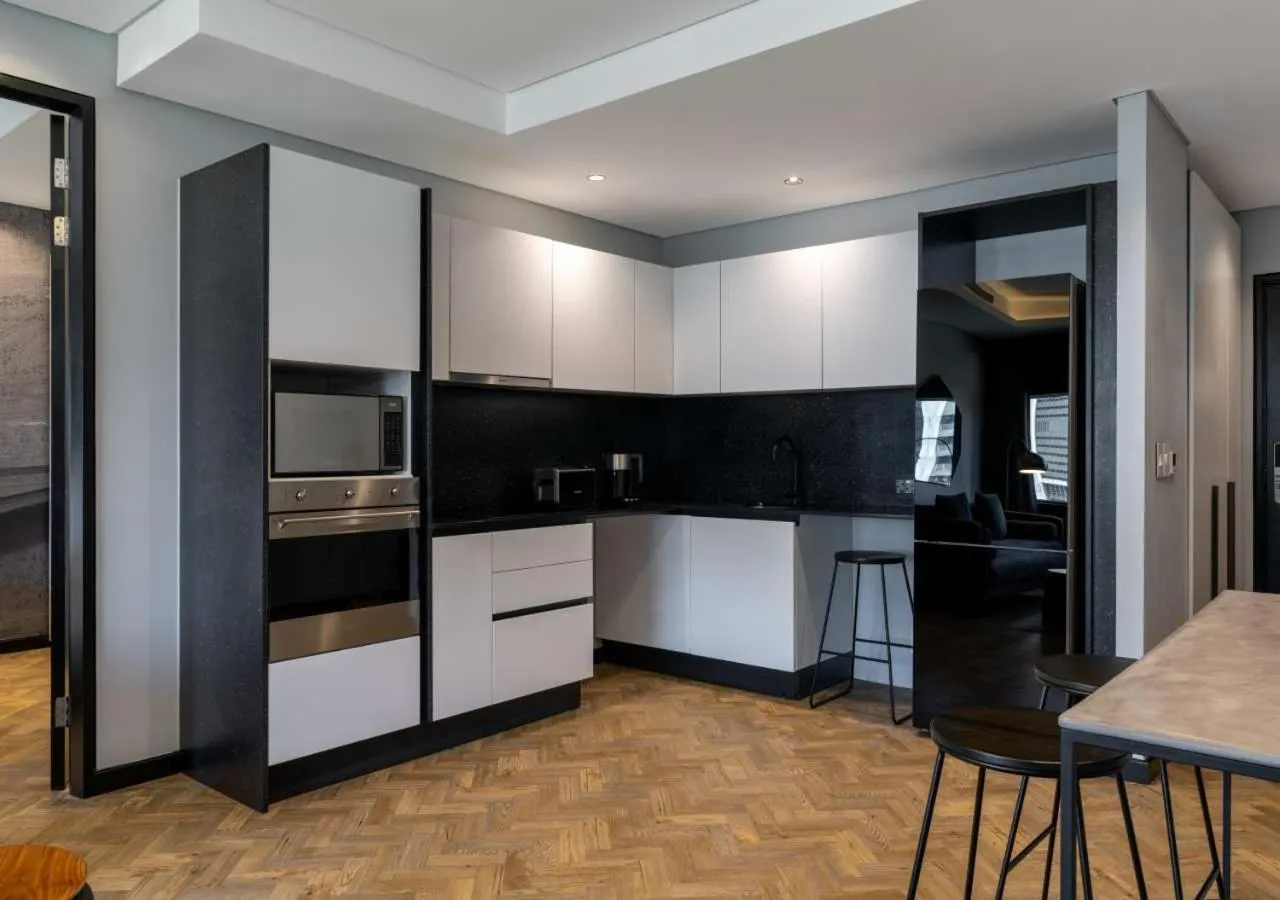 Kitchen or kitchenette in The Onyx Apartment Hotel by NEWMARK