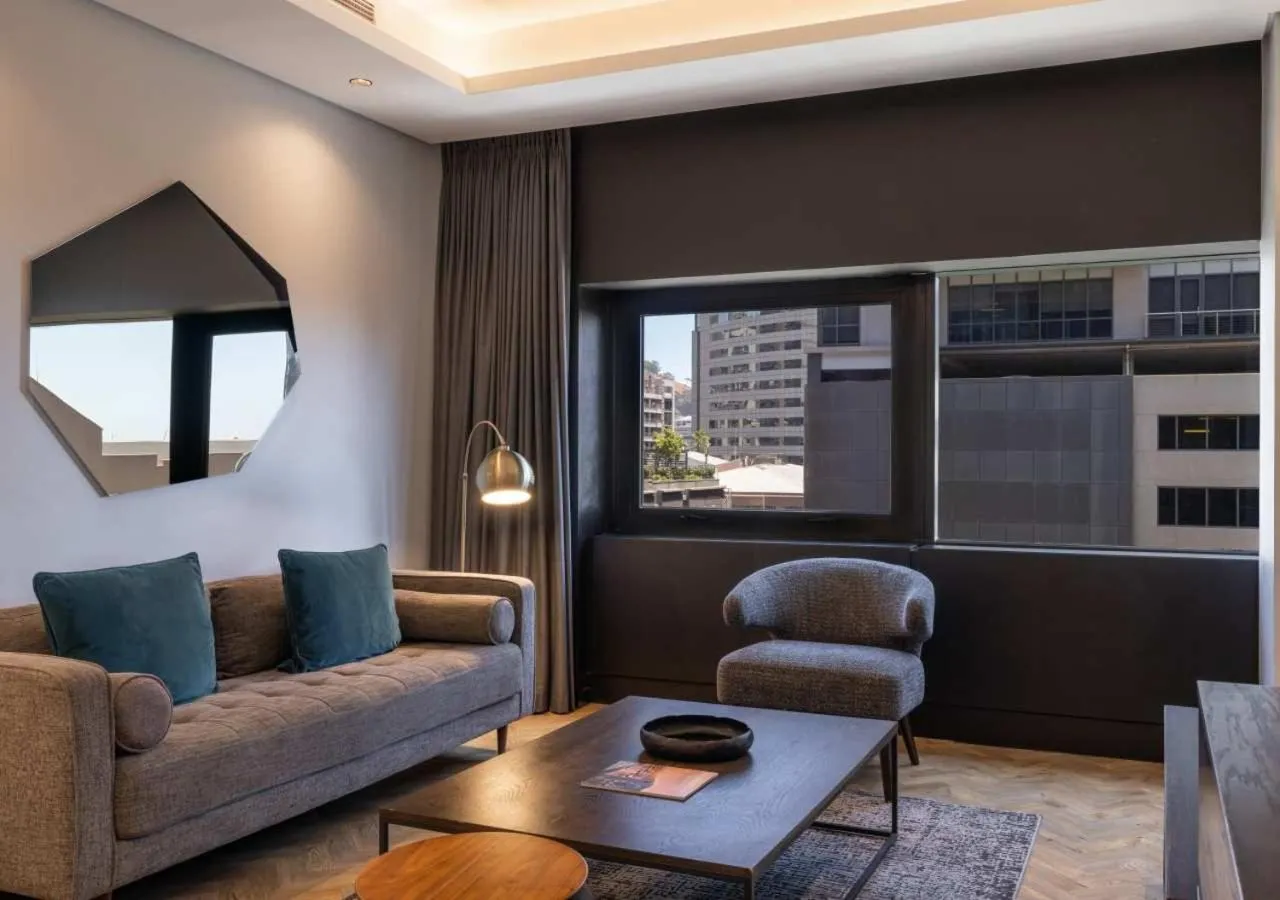 Living room in The Onyx Apartment Hotel by NEWMARK