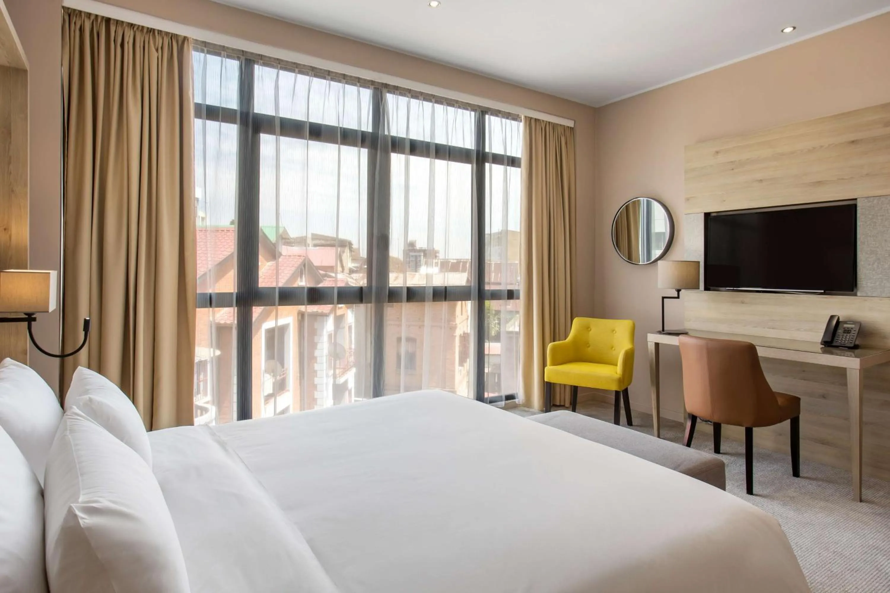 Photo of the whole room, Bed in Radisson Serviced Apartments Antananarivo City Centre