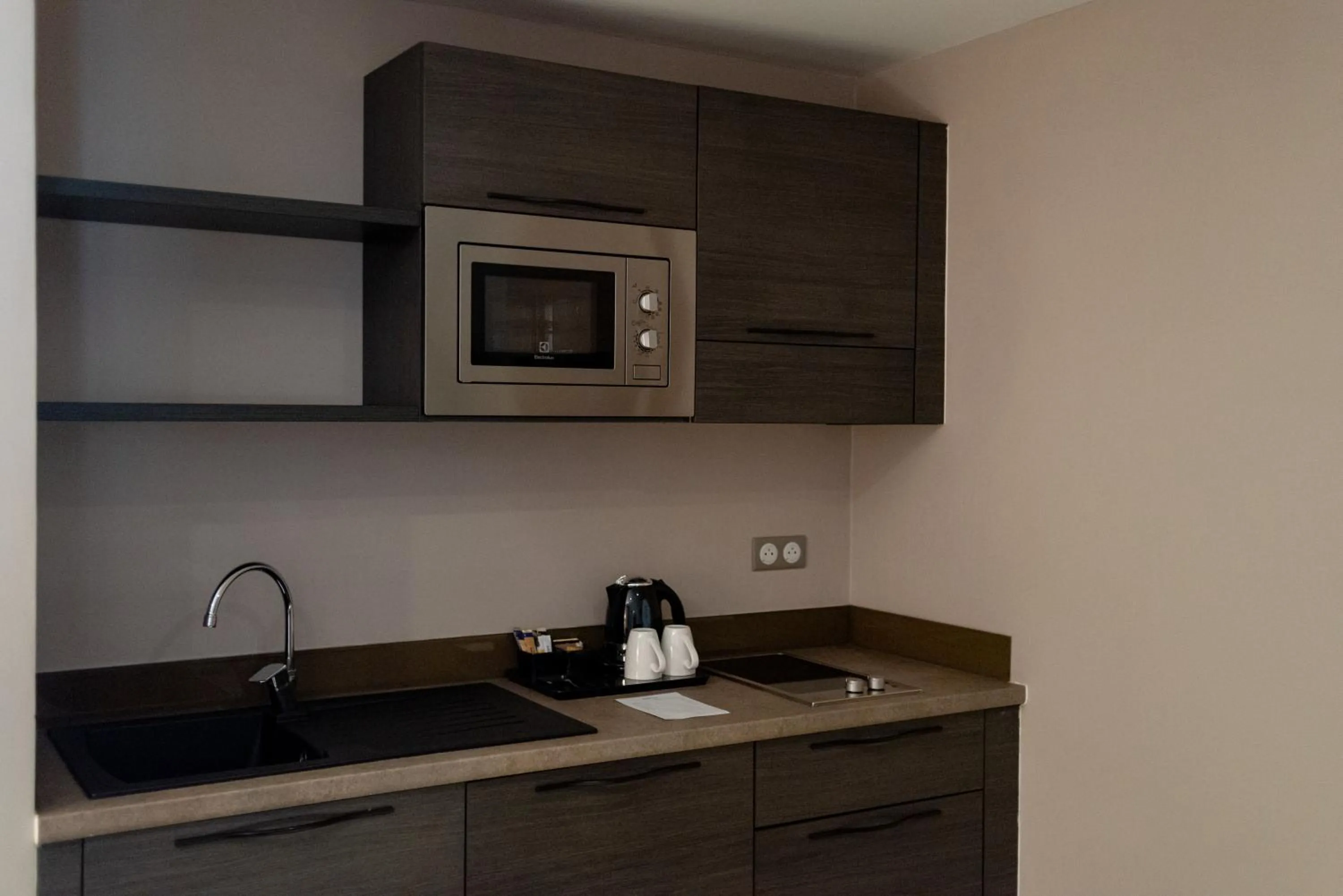 Kitchen or kitchenette in Radisson Serviced Apartments Antananarivo City Centre