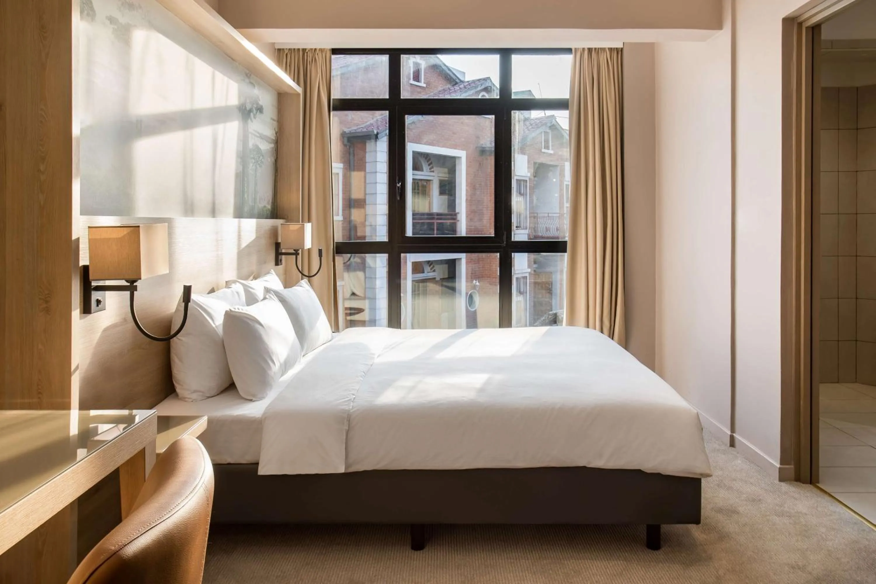 Photo of the whole room, Bed in Radisson Serviced Apartments Antananarivo City Centre