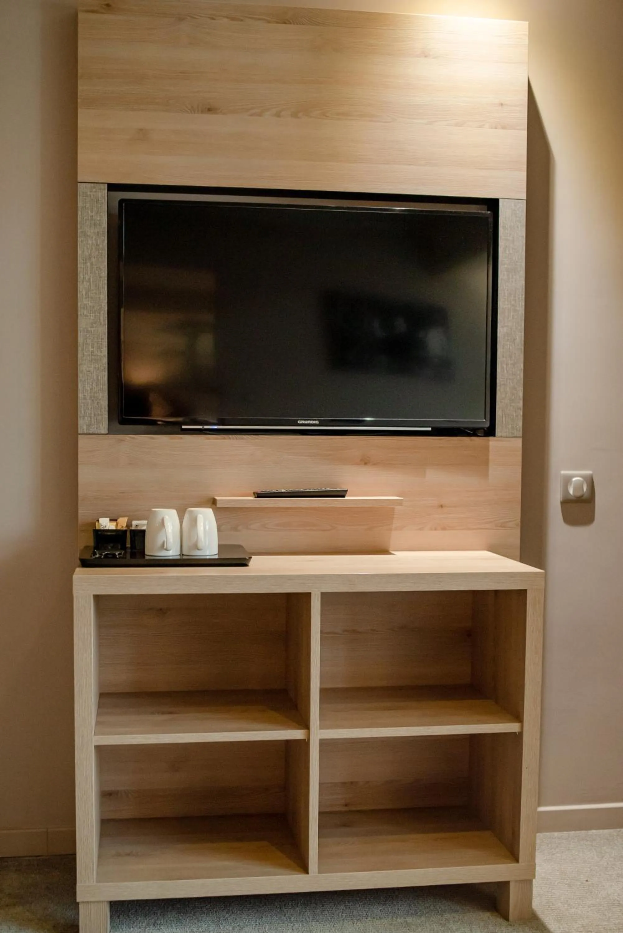 TV and multimedia in Radisson Serviced Apartments Antananarivo City Centre