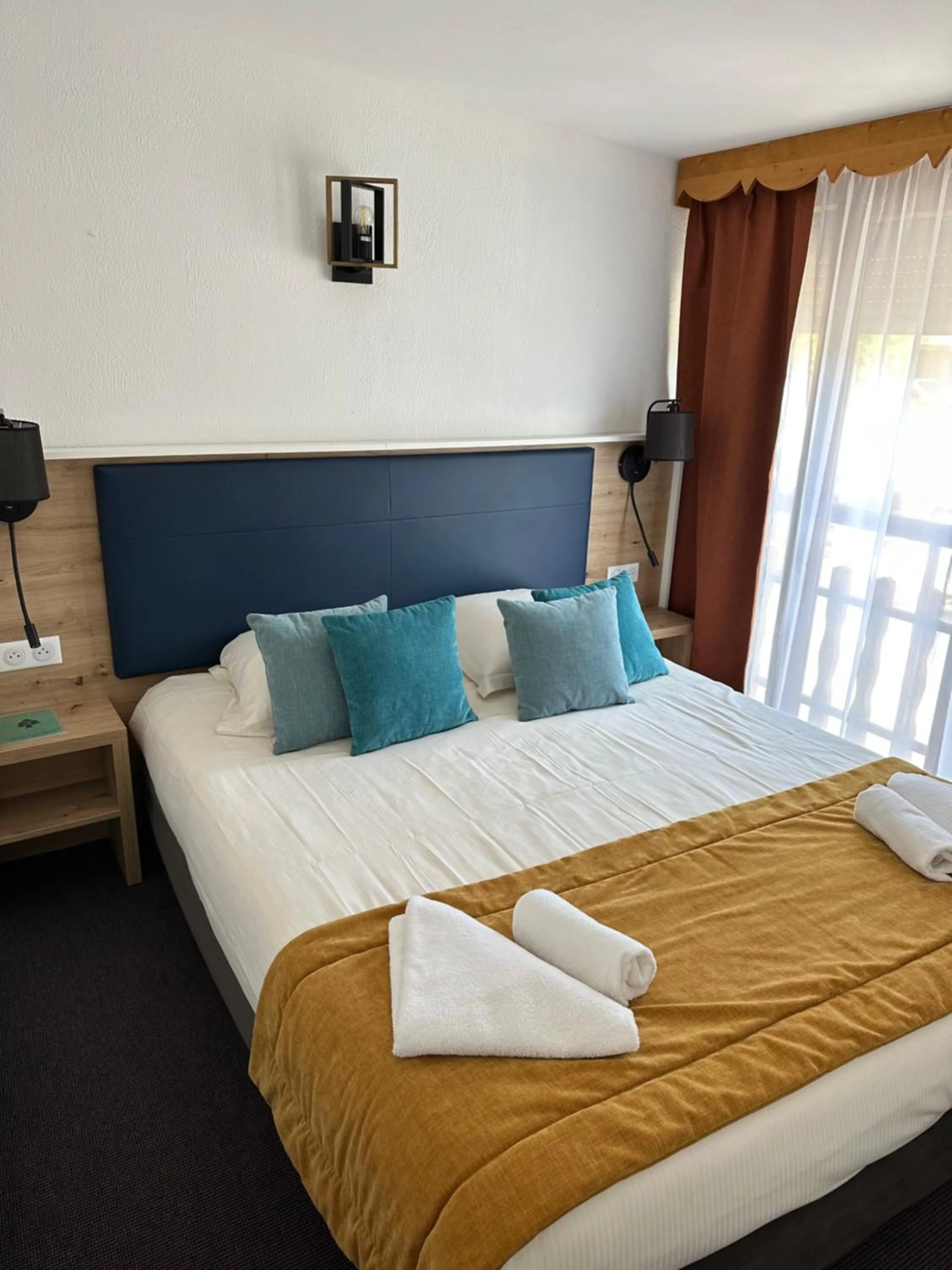 Bed in Hôtel Le Blainon