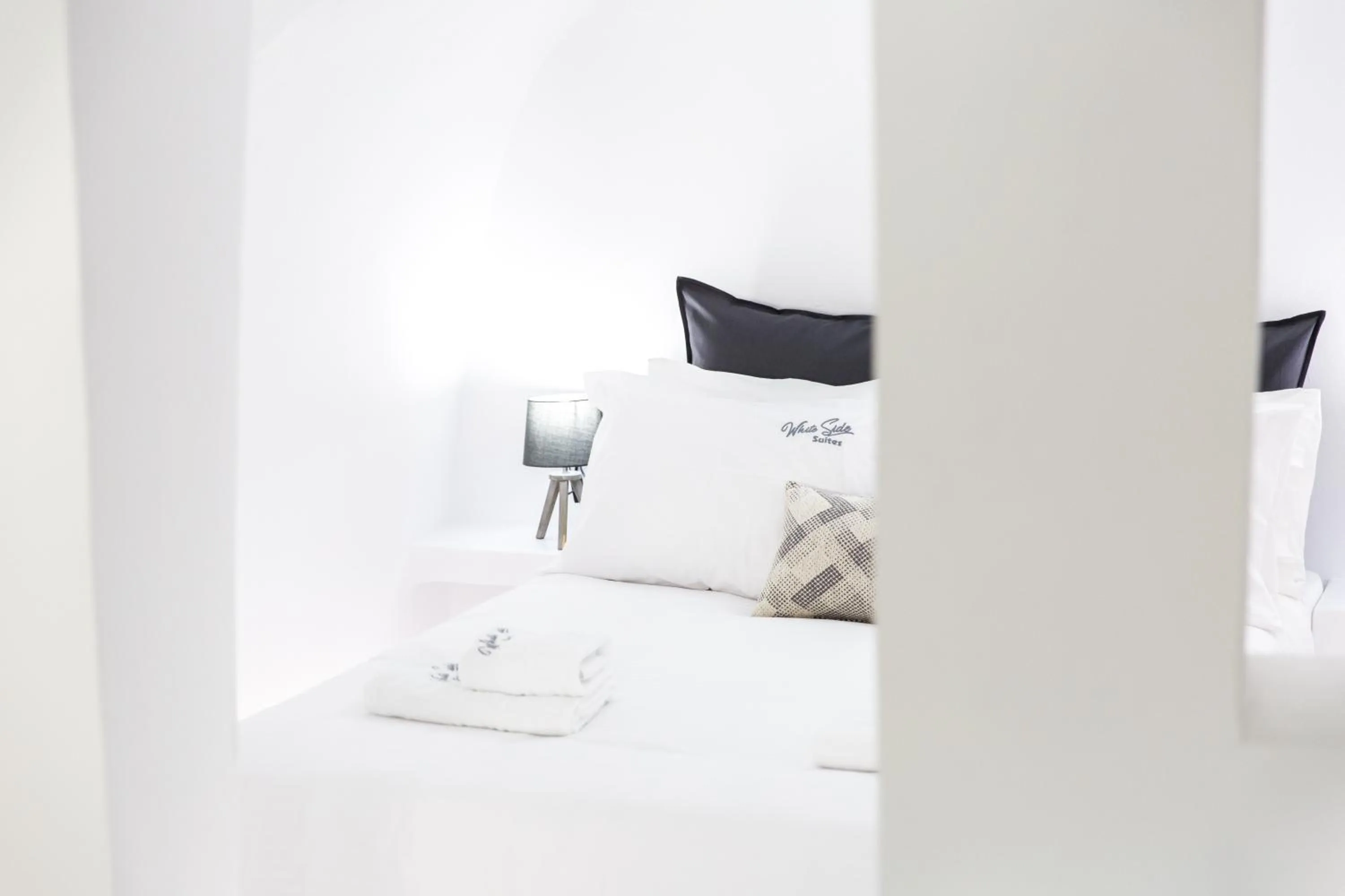 Bed in White Side Suites