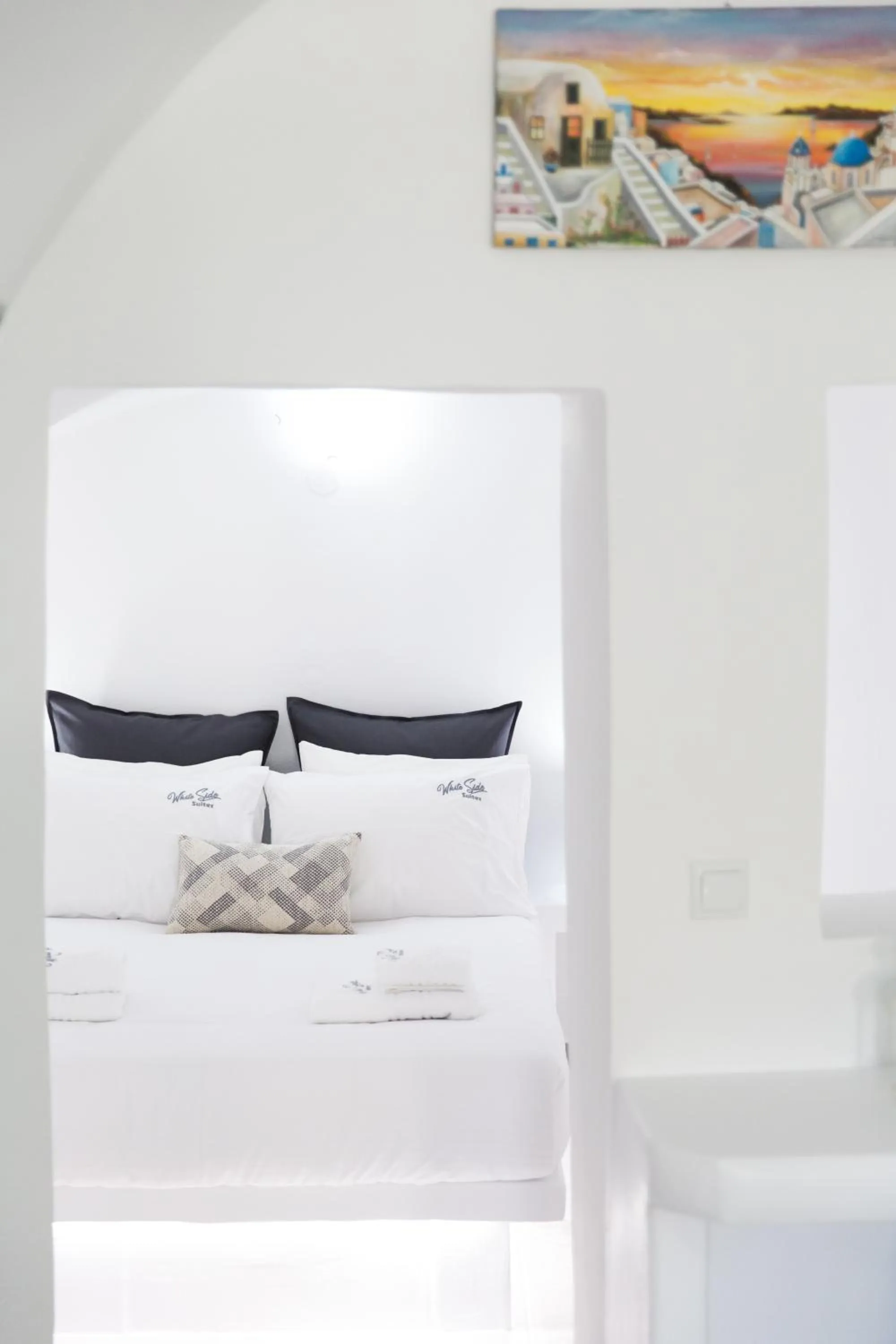 Bed in White Side Suites