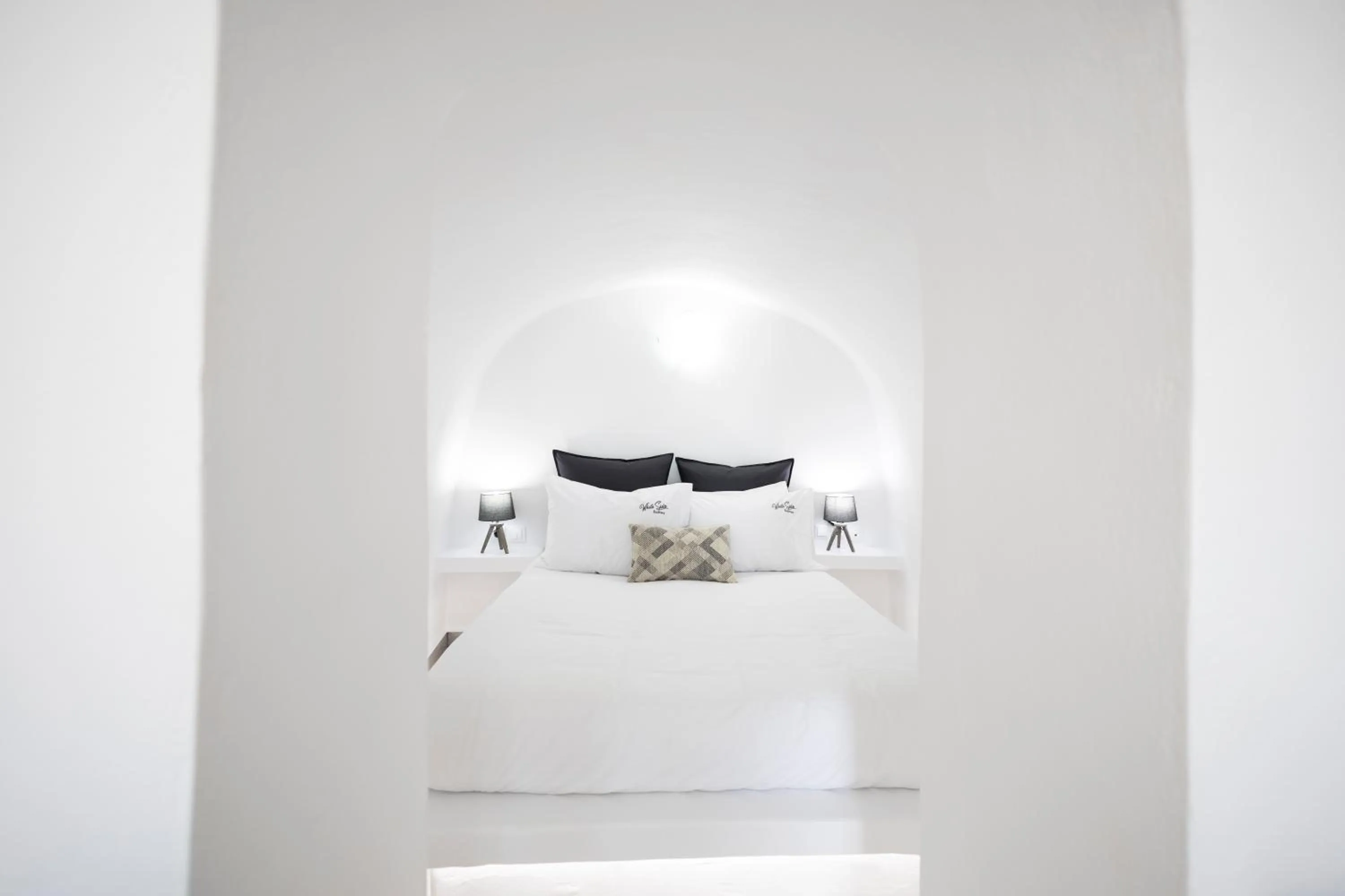 Bed in White Side Suites
