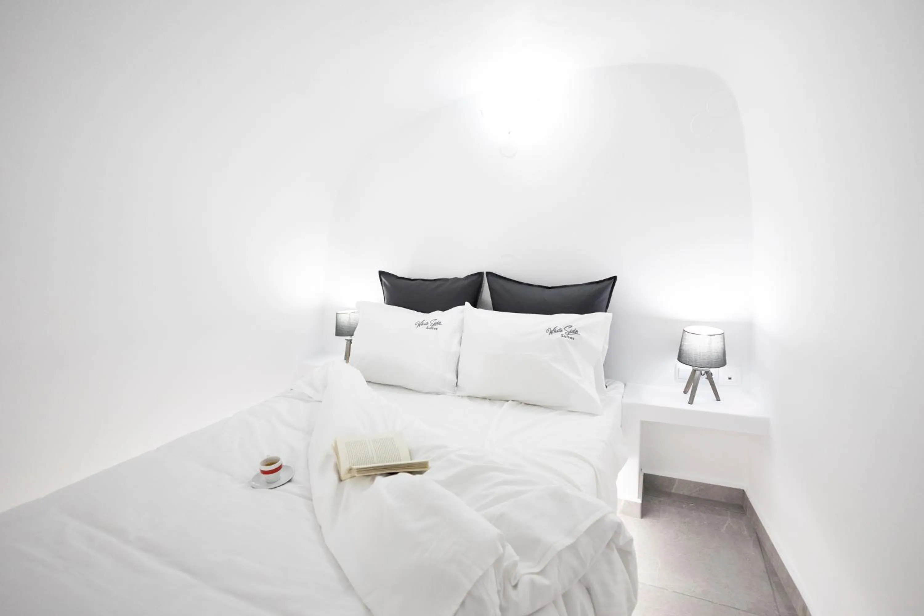 Bed in White Side Suites