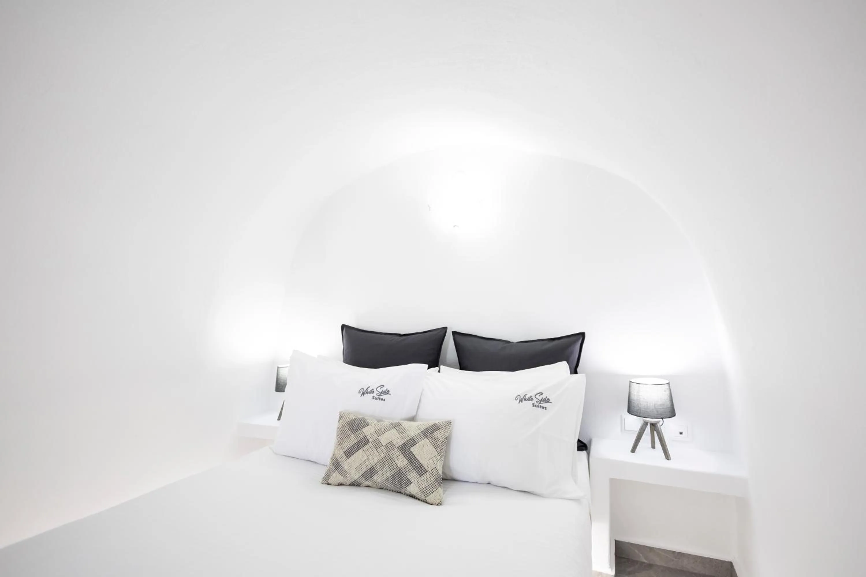 Bed in White Side Suites