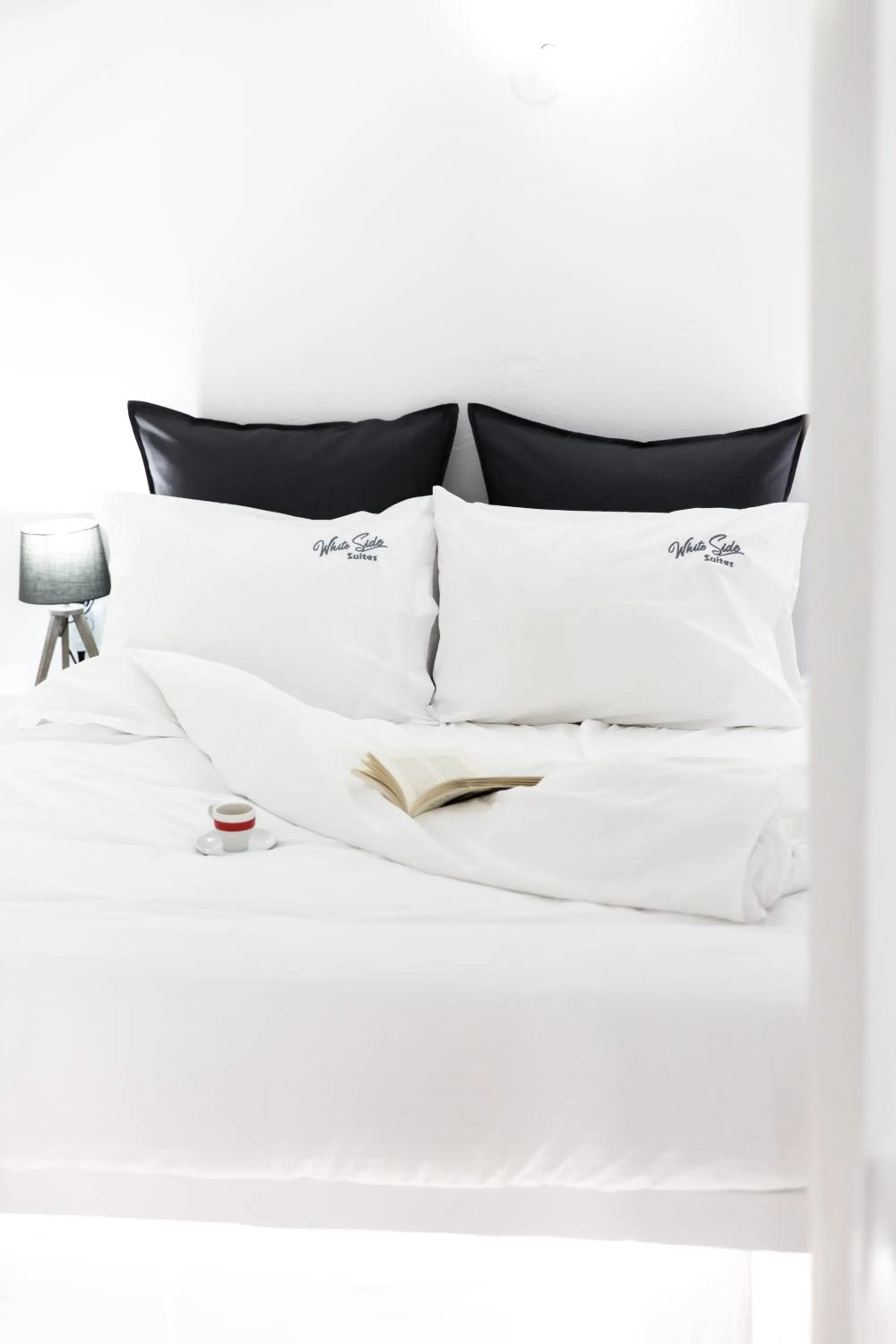 Bed in White Side Suites