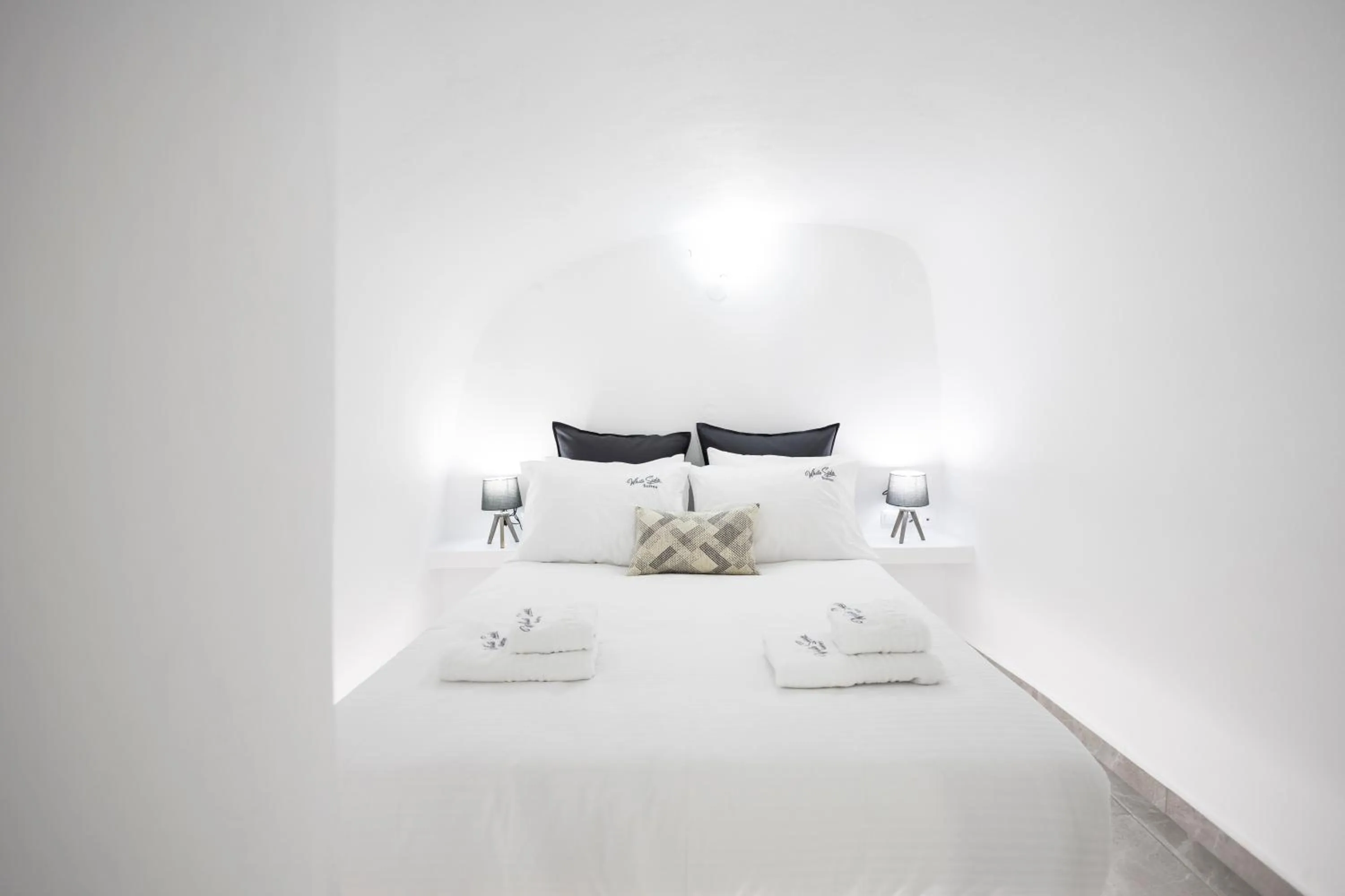 Bed in White Side Suites